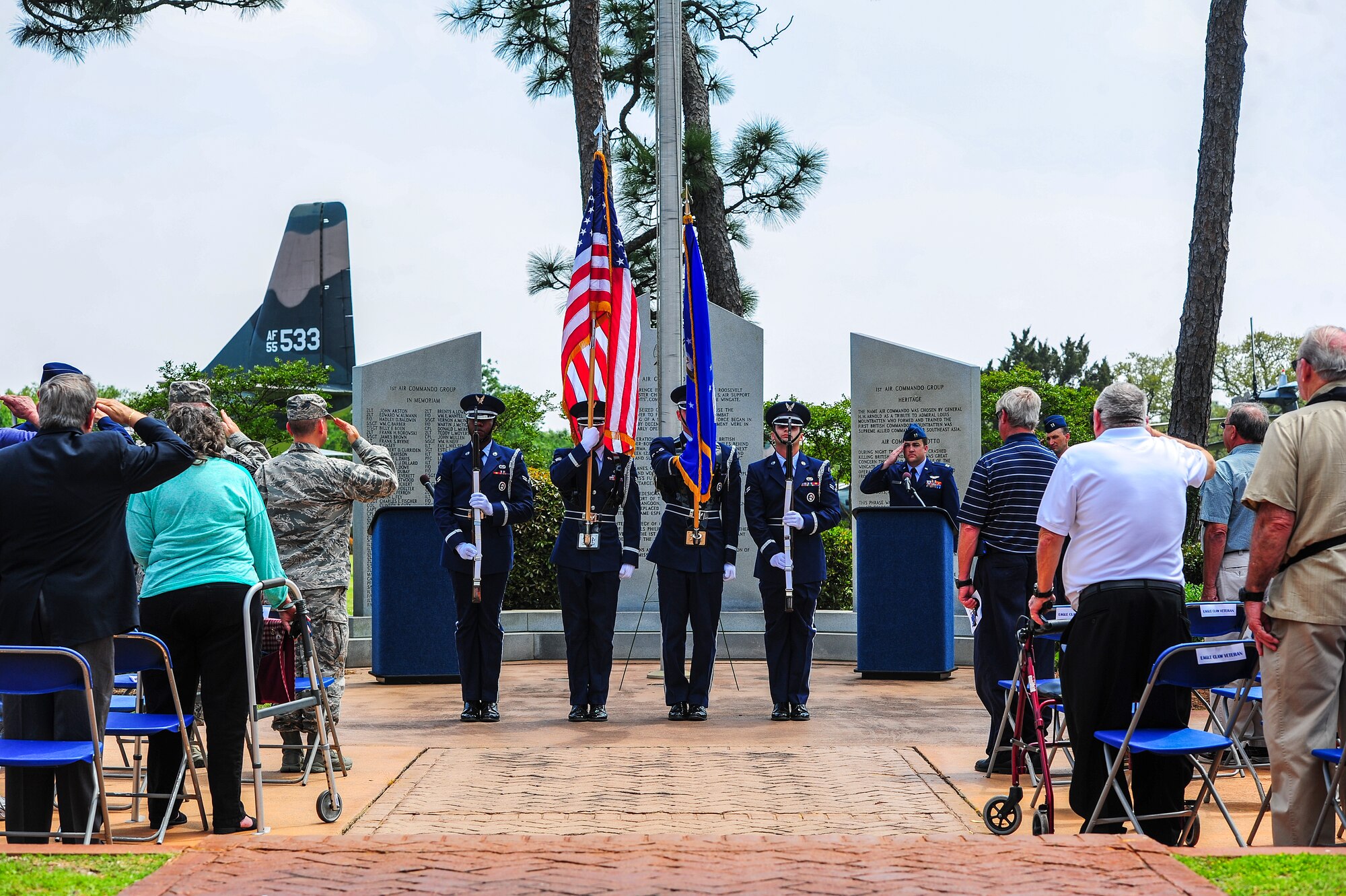 Members of the honor guard present the colors at the Operation Eagle Claw ceremony at the air park on Hurlburt Field, Fla., April 24, 2014. Eight service members were killed during Operation Eagle Claw. (U.S. Air Force photo/Airman 1st Class Jeff Parkinson)