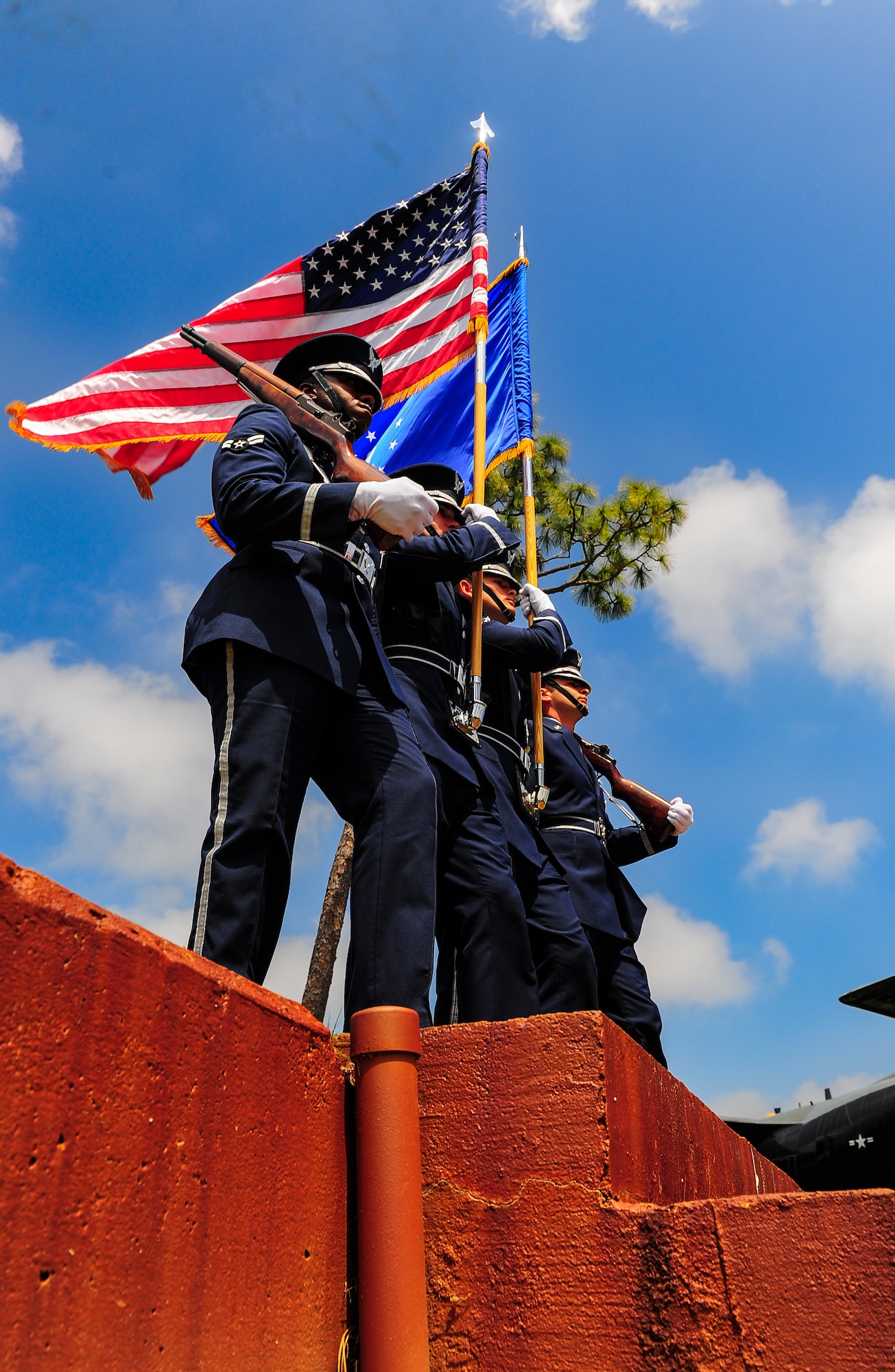 Members of the honor guard march toward the Operation Eagle Claw ceremony at the air park on Hurlburt Field, Fla., April 24, 2014. Operation Eagle Claw was an operation ordered by President Jimmy Carter to attempt to end the Iran hostage crisis on April 24, 1980. (U.S. Air Force photo/Airman 1st Class Jeff Parkinson)