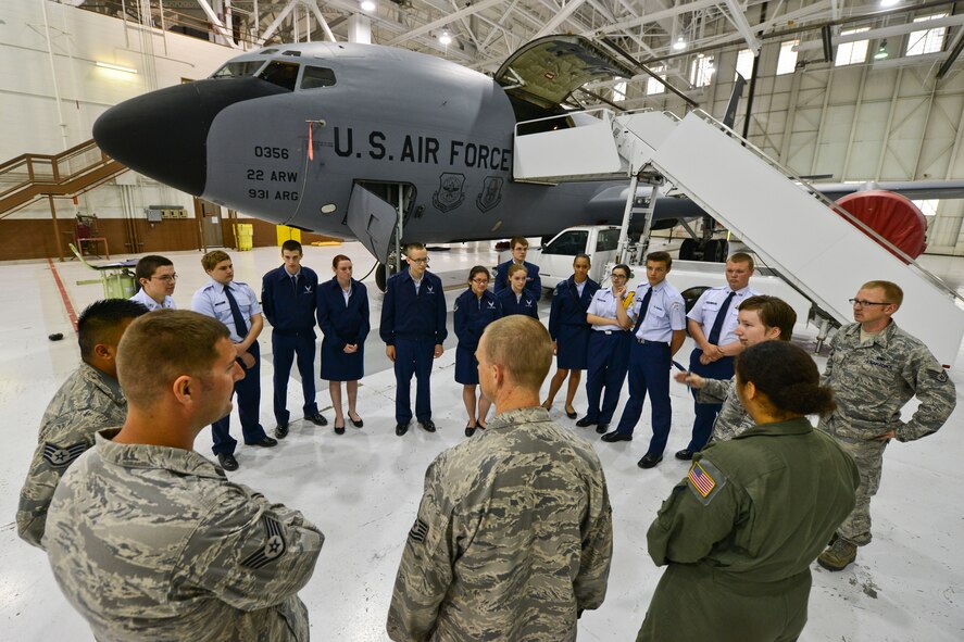 Junior ROTC cadets from Derby High School tour a KC-135 Stratotanker hanger, April 24, 2014, at McConnell Air Force Base, Kan. Aircrew and maintainers showed them different aspects of the aircraft and answered their questions. The cadets were part of a larger group of local middle school and high school junior ROTC flights who toured multiple areas of the base. (U.S. Air Force photo/Airman 1st Class John Linzmeier)