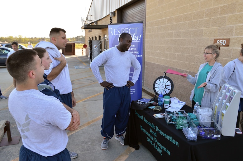 Karen Smith, Pope Field’s sexual assault response coordinator, briefs Pope Airmen about Pope’s sexual assault awareness program during Team Pope’s sexual assault awareness month 5K fun run on April 24, Pope Army Airfield, N.C. (U.S. Air Force photo/Marvin Krause)

