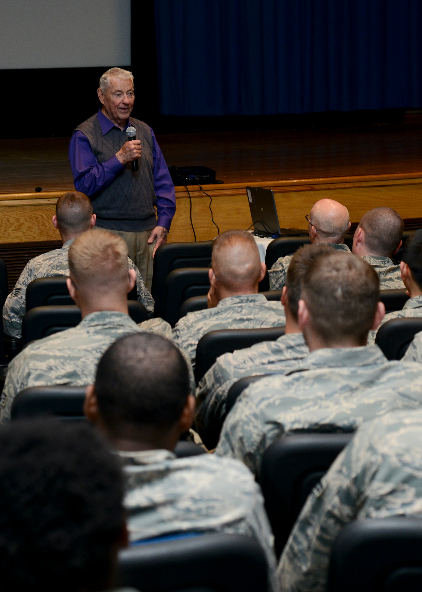 Retired Chief Master Sgt. of the Air Force Robert D. Gaylor visits with Airmen at Langley Air Force Base, Va., April 23, 2014. Gaylor visited various organizations including the Airman Leadership School, Crossbow Dining Facility and the base theater. (U.S. Air Force photo by Airman 1st Class Victoria H. Taylor/Released) (This image was cropped and altered to enhance the subject)