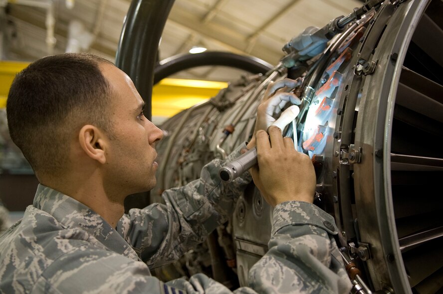 Senior Airman Justin Stringer, 4th Component Maintenance Squadron propulsion flight journeyman, completes an inspection on an F-15E Strike Eagle engine, April 10, 2014, at Seymour Johnson Air Force Base, N.C. After completing the inspection, the engine will be brought to the test cell to ensure it’s mission capable. (U.S. Air Force photo/Airman 1st Class Shawna L. Keyes)   