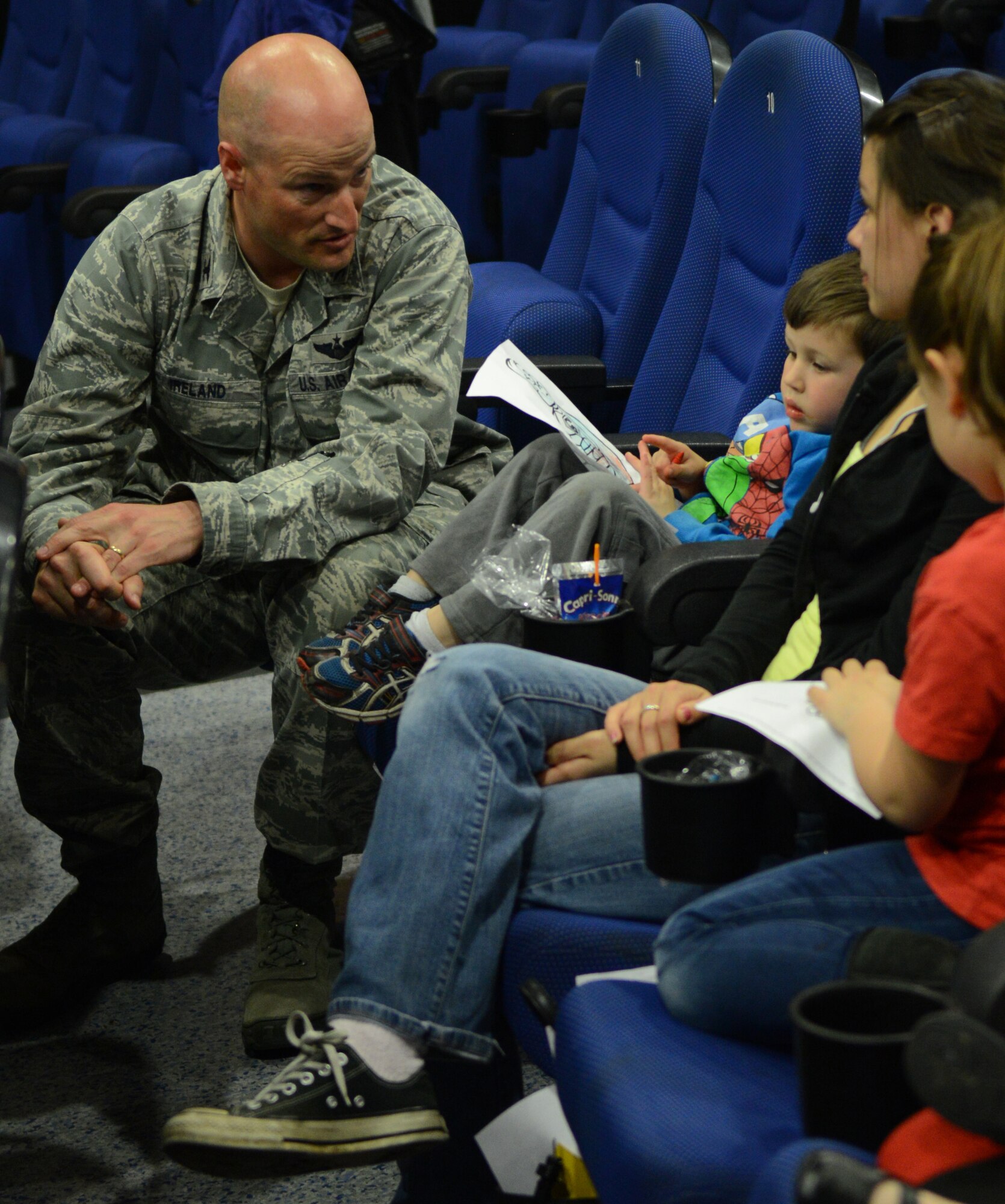 U.S. Air Force Col. Christopher Ireland, 352nd Special Operations Group commander, speaks to Team Mildenhall families at a Hearts Apart dinner April 14, 2014, on RAF Mildenhall, England. Hearts Apart dinners are a way for families of deployed service members to connect with one another. (U.S. Air Force photo by Airman 1st Class Jonathan Light/Released)