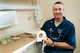 Tech. Sgt. Tim McGee, 60th Dental Squadron maxillofacial laboratory technician, displays a prosthetic he has been working on Monday in the David Grant USAF Medical Center Dental Clinic.(U.S. Air Force photo/Staff Sgt. Patrick Harrower)
