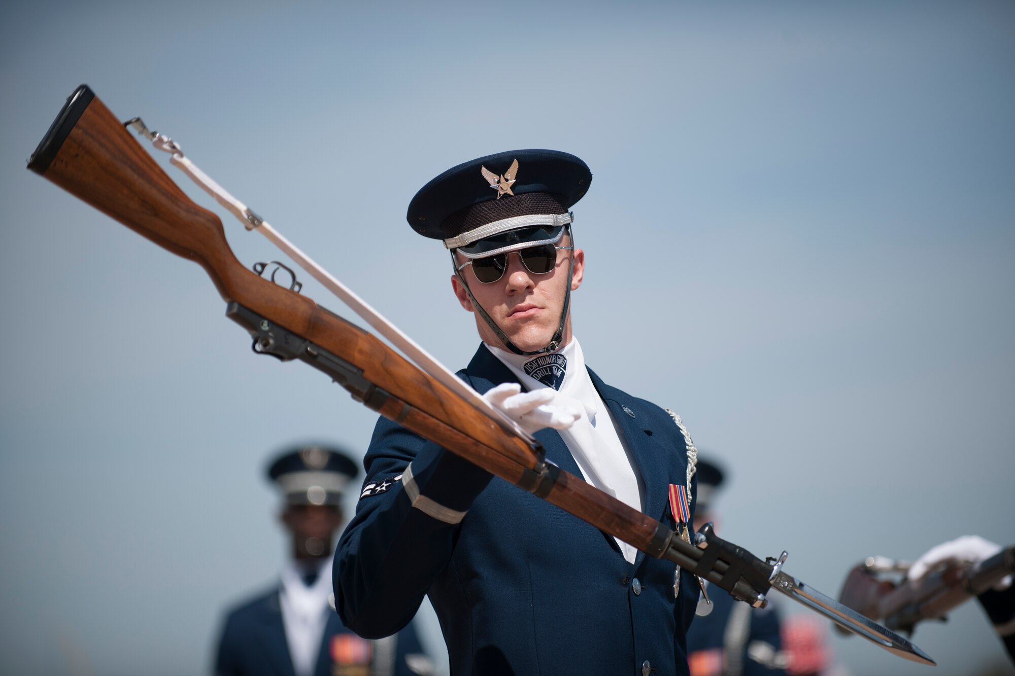 Airman 1st Class Brandon Clement, U.S. Air Force Honor Guard Drill Team performs  during the Joint Service Drill Exhibition, April 12, 2014, at the Jefferson Memorial in Washington, D.C. (U.S. Air Force Photo/Staff Sgt. Robert Cloys)