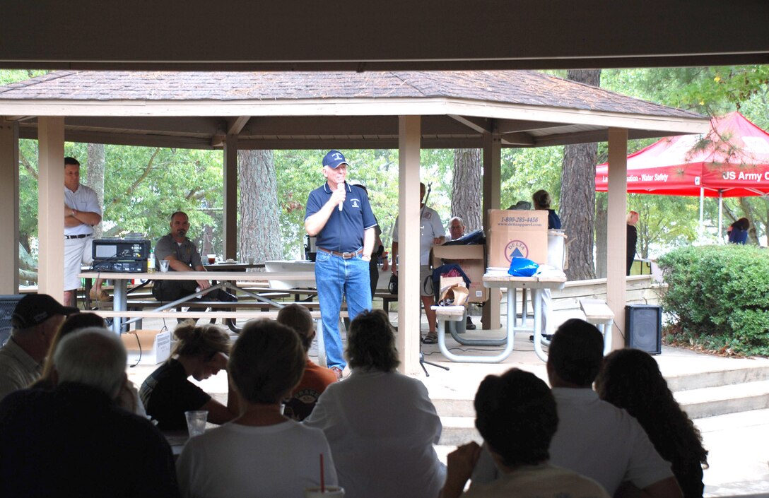 Herb Burnham, executive director of the Lake Hartwell Association (LHA), talks to volunteers during a volunteer appreciation picnic hosted by LHA on National Public Lands Day.