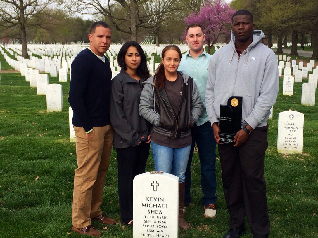 Marines with Marine Wing Communications Squadron 28 visit the grave of Lt. Col. Kevin M. Shea at Arlington National Cemetery after winning an award honoring his legacy.