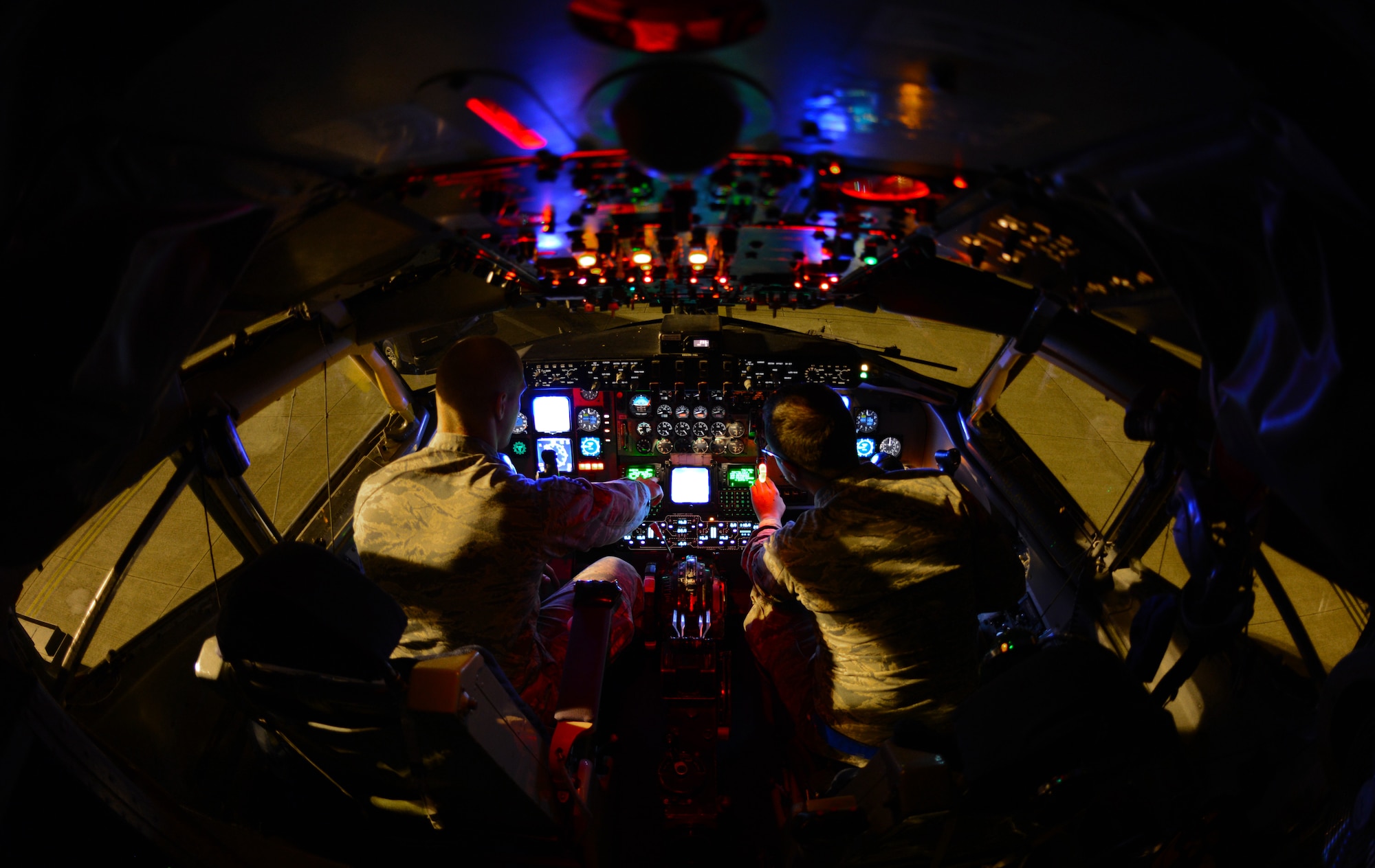Senior Airman Jarred McGlothin, left, and Airman 1st Class Larry May perform an instrument check on a KC-135 Stratotanker April 17, 2014, at Royal Air Force Mildenhall, England. Regular instrument inspections are critical to ensure the aircraft is fit to fly. McGlothin and May are 100th Aircraft Maintenance Squadron instruments and flight controls systems journeymen. (U.S. Air Force photo/Airman 1st Class Dillon Johnston)