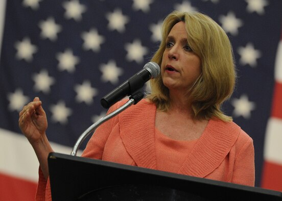 Secretary of the Air Force Deborah Lee James speaks to members of Altus AFB during an all call April 23, 2014, at Altus Air Force Base, Okla. The visit marked James’ first trip to Altus AFB as the Secretary of the Air Force. The secretary met with civic leaders, spoke to base personnel about the future of the Air Force and learned more about cost-saving innovations initiated at the base. (U.S. Air Force photo/Senior Airman Levin Boland)
