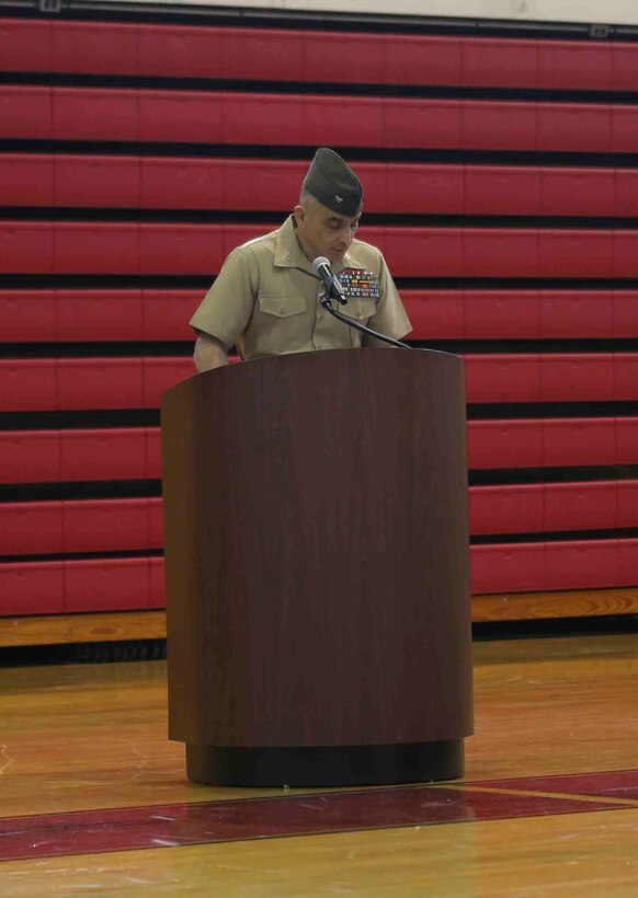 Colonel Clifford J. Weinstein, the commanding officer with 10th Marine Regiment, 2nd Marine Division, gives a brief lineage of the regiment and thanks the guests, families, Marines, and sailors of 10th Marines during a battle color rededication ceremony April 25, 2014. The ceremony was held to celebrate the regiment’s 100th anniversary, preserve the history of 10th Marines and to memorialize the regiment’s past through its present Marines and sailors.