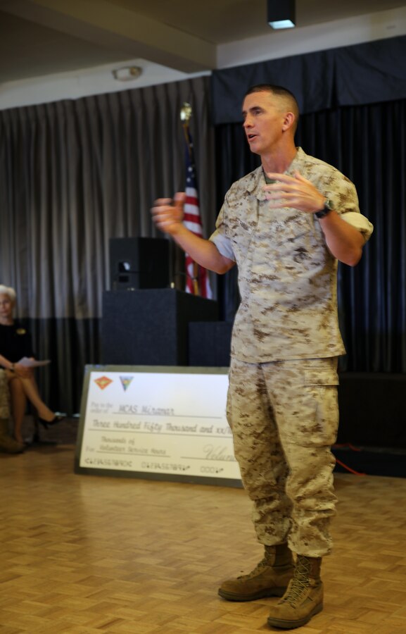 Col. John Farnam, Marine Corps Air Station Miramar commanding officer, commends volunteers for their efforts throughout the air station and local communities during the 2014 Volunteer Appreciation Celebration aboard MCAS Miramar, Calif., April 24.  More than 900 service members and families volunteered on behalf of the air station and 3rd Marine Aircraft Wing. 