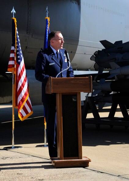 Maj. Gen. Scott Vander Hamm, 8th Air Force commander, talks to Team Barksdale members during a ceremony honoring the Combat Network Communications Technology system recently completed on a B-52H Stratofortress at Barksdale Air Force Base, La., April 25, 2014. The B-52 has been in maintenance since July 2013 and the new CONECT upgrade essentially changed the aircraft from a rotary-dial phone to a smartphone, allowing pilots to receive machine-to-machine retargeting, rather than having the crew and mission dependent solely upon information available at take-off. (U.S. Air Force photo/Senior Airman Joseph A. Pagán Jr.)