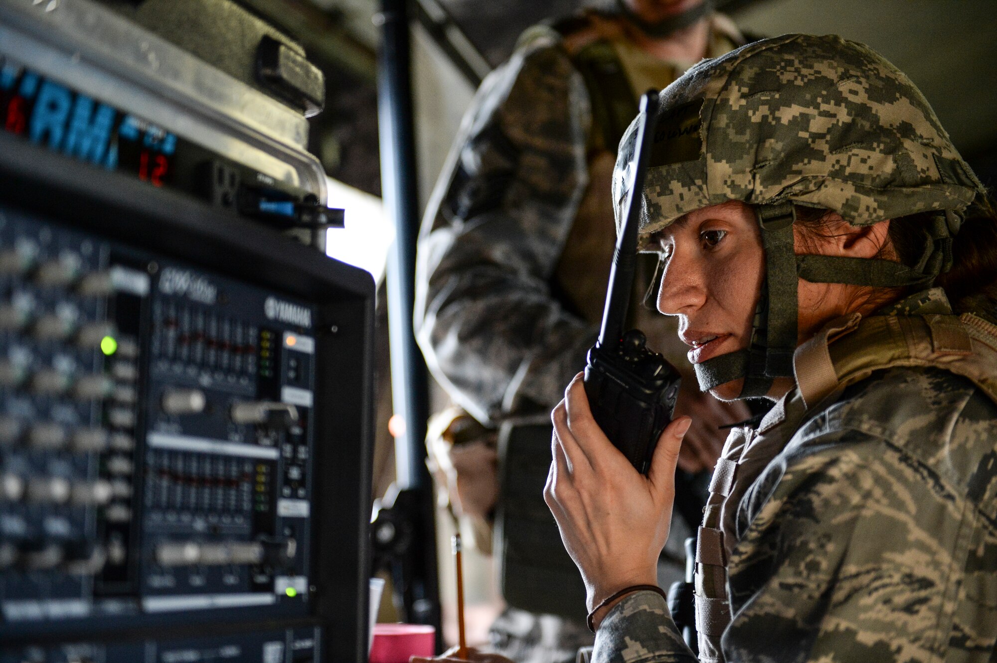 U.S. Air Force Capt. Melissa Collins, 354th Civil Engineer Squadron engineering flight officer in charge, directs element leaders during Ability to Survive and Operate training April 22, 2014, Eielson Air Force Base, Alaska. The ATSO training tested Eielson Icemen with various emergency situations including chemical and aerial attack, and self-aid and buddy care. (U.S. Air Force photo by Senior Airman Peter Reft/Released)