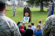 Garth Davis addresses the crowd during the annual Arbor Day celebration in Miller Park at Fairchild Air Force Base, Wash., April 25, 2014. The base celebrates 20 years as a Tree City USA. This recognizes the base for effectively managing public tree resources and to encourage the implementation of community tree management. Davis is a Spokane County Conservation District forester. (U.S. Air Force photo by Staff Sgt. Benjamin W. Stratton/Released)