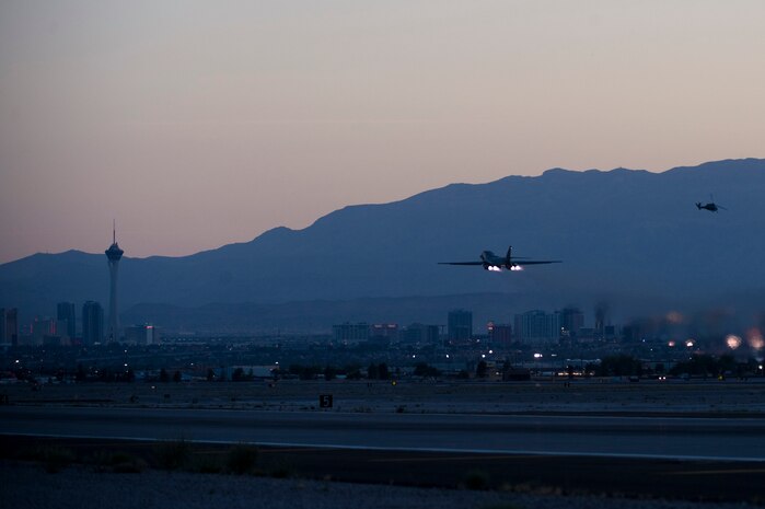 A U.S. Air Force B-1B Lancer assigned to the 7th Bomb Wing, Dyess Air Force Base, Texas, takes off during Green Flag 14-6 April 24, 2014, at Nellis Air Force Base, Nev. B-1B Lancers can rapidly deliver massive quantities of precision and non-precision weapons against any adversary, anywhere in the world, at any time. (U.S. Air Force photo by Senior Airman Christopher Tam)