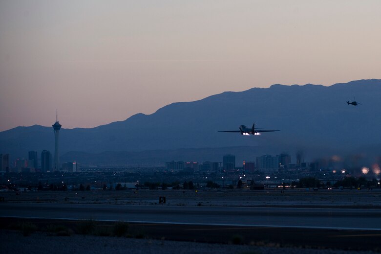 A U.S. Air Force B-1B Lancer assigned to the 7th Bomb Wing, Dyess Air Force Base, Texas, takes off during Green Flag 14-6 April 24, 2014, at Nellis Air Force Base, Nev. B-1B Lancers can rapidly deliver massive quantities of precision and non-precision weapons against any adversary, anywhere in the world, at any time. (U.S. Air Force photo by Senior Airman Christopher Tam)