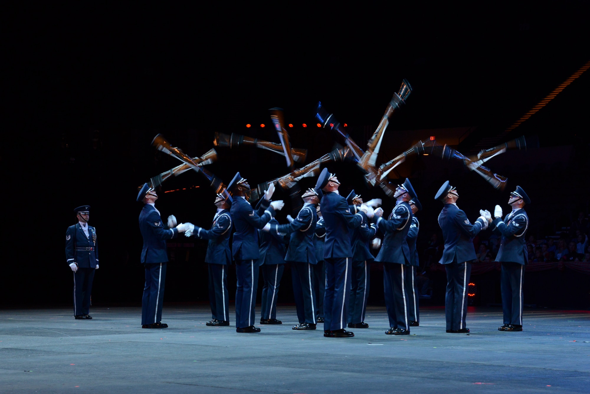 The U.S. Air Force Honor Guard Drill Team performs during the Virginia International Tattoo, Virginia Art Festival, at the Scope Arena in Norfolk, Va., April 23, 2014. The festival is held in honor of veterans and their families. (U.S. Air Force photo by Airman 1st Class Devin Scott Michaels/Released)(This image was cropped to emphasize the subject)
