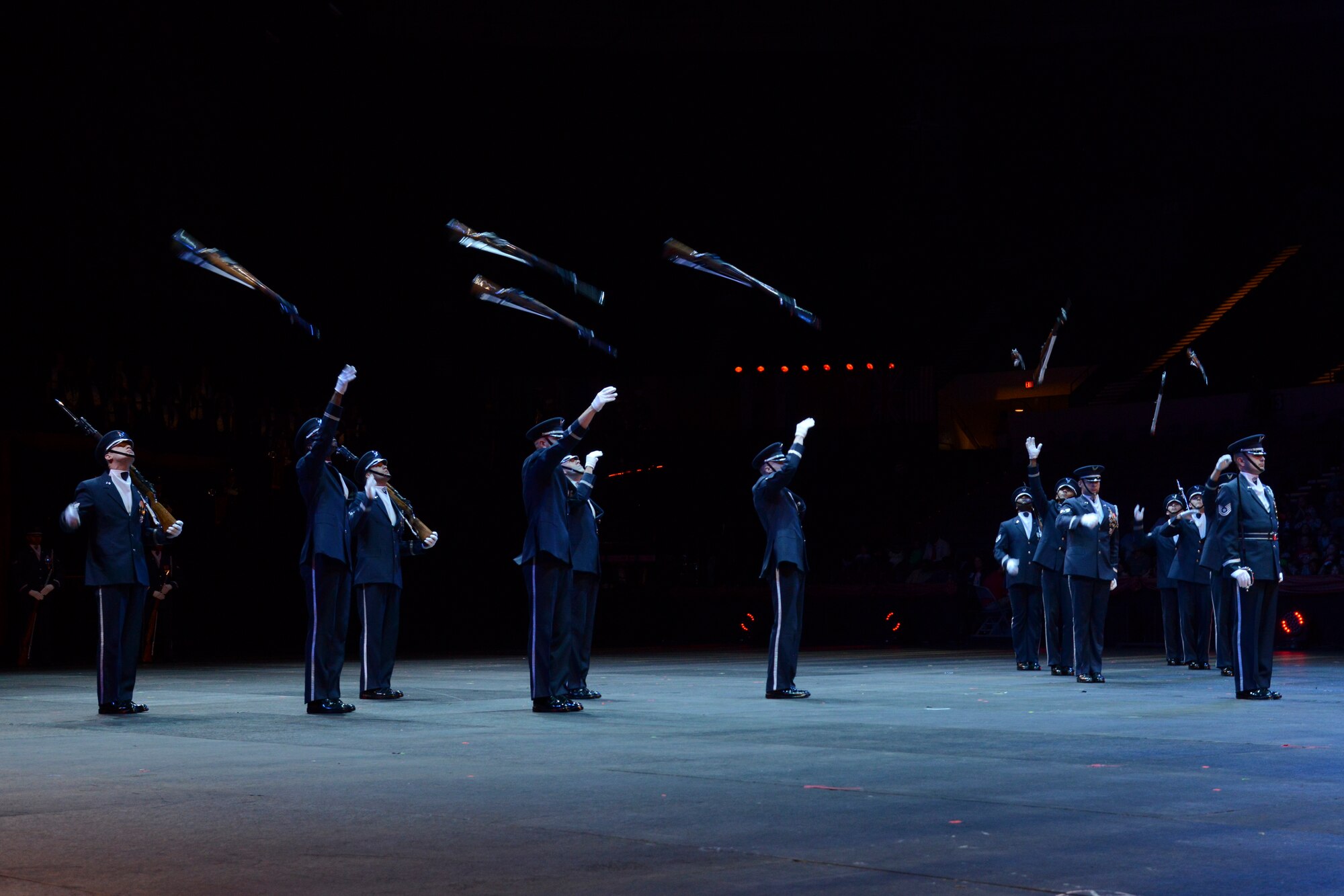 The U.S. Air Force Honor Guard Drill Team performs during the Virginia International Tattoo, Virginia Art Festival, at the Scope Arena in Norfolk, Va., April 23, 2014. Each spring, internationally acclaimed artists from around the globe perform with music, dance and drills. (U.S. Air Force photo by Airman 1st Class Devin Scott Michaels/Released)(This image was cropped to emphasize the subject)