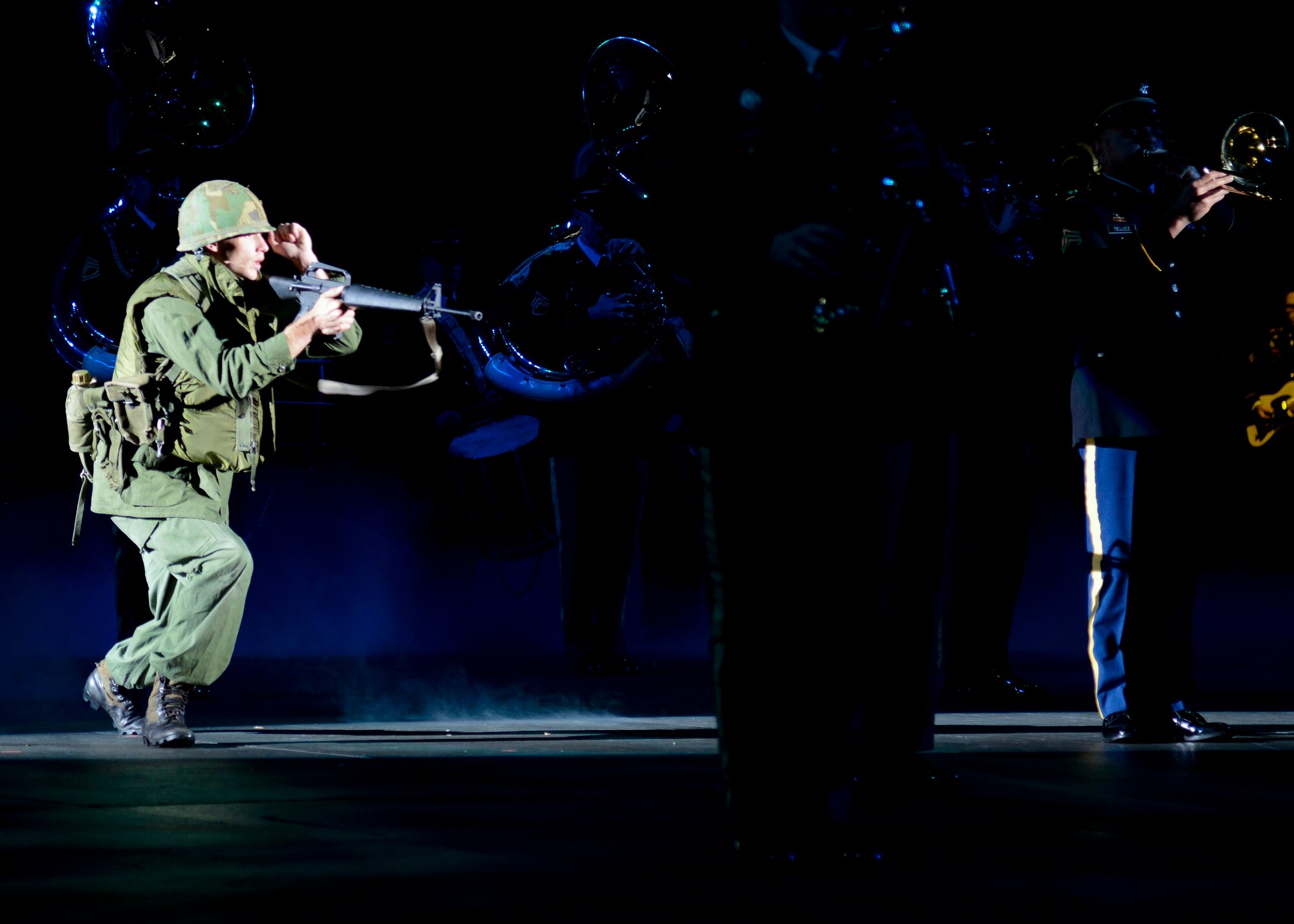 The U.S. Army Training and Doctrine Command Band performs during the Virginia International Tattoo, Virginia Arts Festival at the Scope Arena in Norfolk, Virginia, April 24, 2014. Tattoo’s are exhibitions of marching bands, massed pipes and drums, drill teams, gymnasts, dancers and choirs that emphasize the inclusion of performers from nations outside of America. (U.S. Air Force photo by Airman 1st Class Victoria H. Taylor/Released)