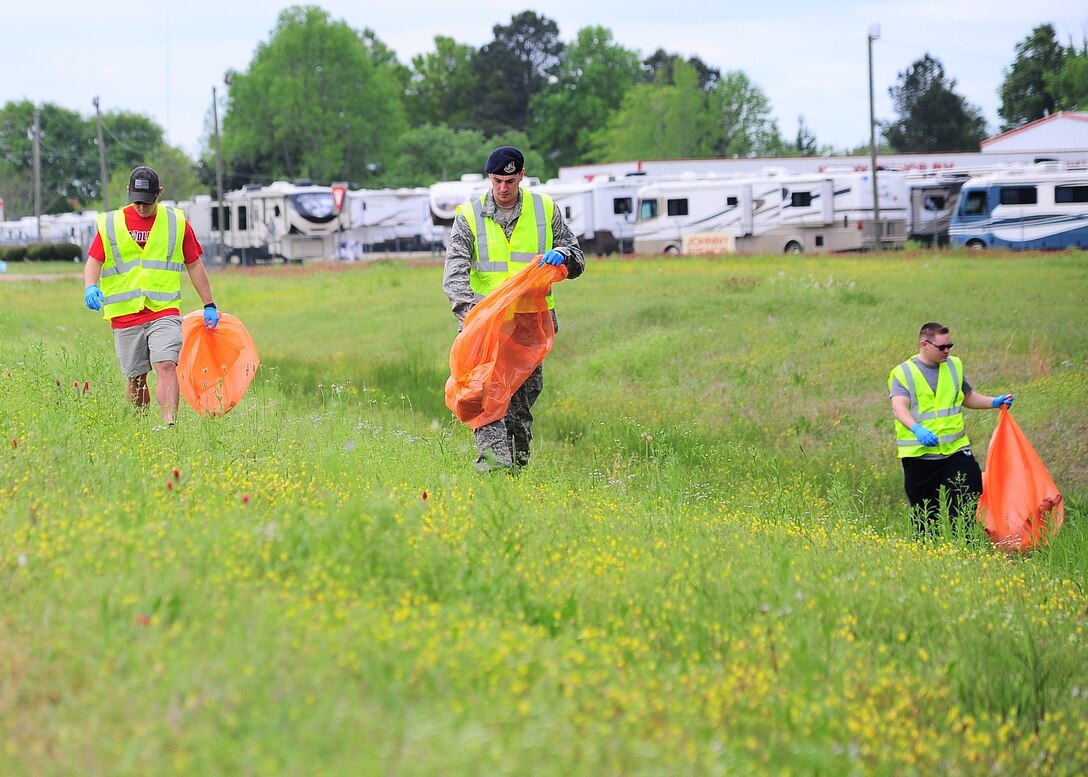 Airmen from the 14th Security Forces Squadron clean-up a portion of Highway 45 north of Columbus Air Force Base April 25. The cleanup is a part of the “Adopt-a-Highway” program, which encourages groups of volunteers to help keep a section of highway free from litter. According to their website, Adopt - A– Highway groups include college fraternities and sororities, civic organizations, church groups, scouts and commercial and private enterprises. Many individuals and families adopt sections of highways to show their pride in Mississippi or in memory of a family member.