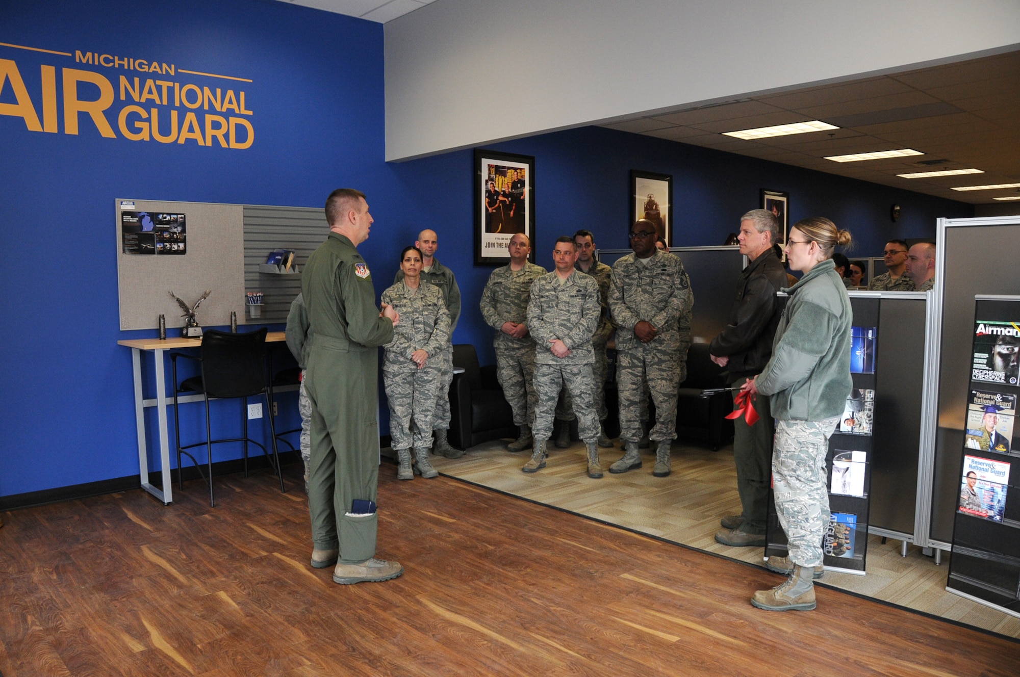 Members of the 110th Airlift Wing, Michigan Air National Guard take part in a ribbon cutting ceremony for the new Air National Guard Career Center and Recruiting Office located in The Shoppes on Stadium in Kalamazoo, Mich., February 22, 2014.  The recruiting station educates applicants who are considering the option of military service in the Air National Guard. (U.S. Air National Guard photo by Master Sgt. Sonia Pawloski/Released)