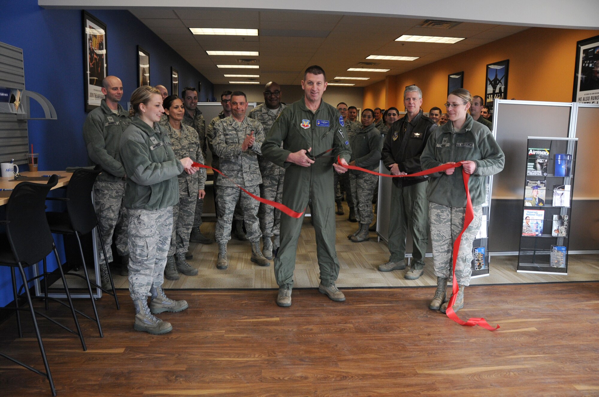 Members of the 110th Airlift Wing, Michigan Air National Guard take part in a ribbon cutting ceremony for the new Air National Guard Career Center and Recruiting Office located in The Shoppes on Stadium in Kalamazoo, Mich., February 22, 2014.  The recruiting station educates applicants who are considering the option of military service in the Air National Guard. (U.S. Air National Guard photo by Master Sgt. Sonia Pawloski/Released)