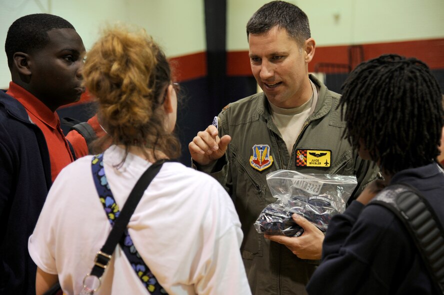 Maj. Mark Whisler, F-16 Fighting Falcon Heritage pilot, speaks to students at Greenacres Middle School in Bossier City, La., April 25, 2014. Whisler will be flying an F-16 for the Heritage Flight during the 2014 Defenders of Liberty Air Show April 26-27. (U.S. Air Force photo/Tech. Sgt. Marie Brown)