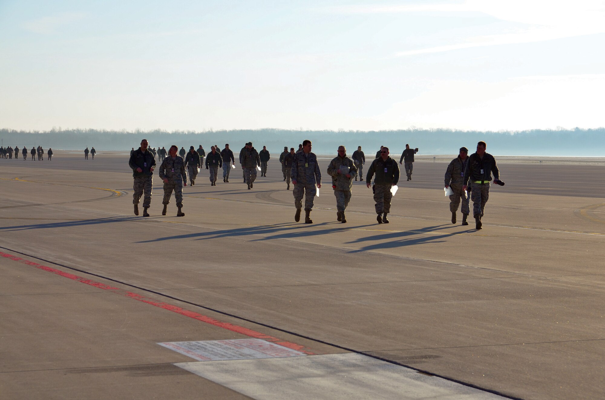 WRIGHT-PATTERSON AIR FORCE BASE, Ohio – Airman from the 445th Airlift Wing look for debris during the unit’s FOD walk held during the April 6 unit training assembly. (U.S. Air Force photo/Maj. Demetrius Smith)