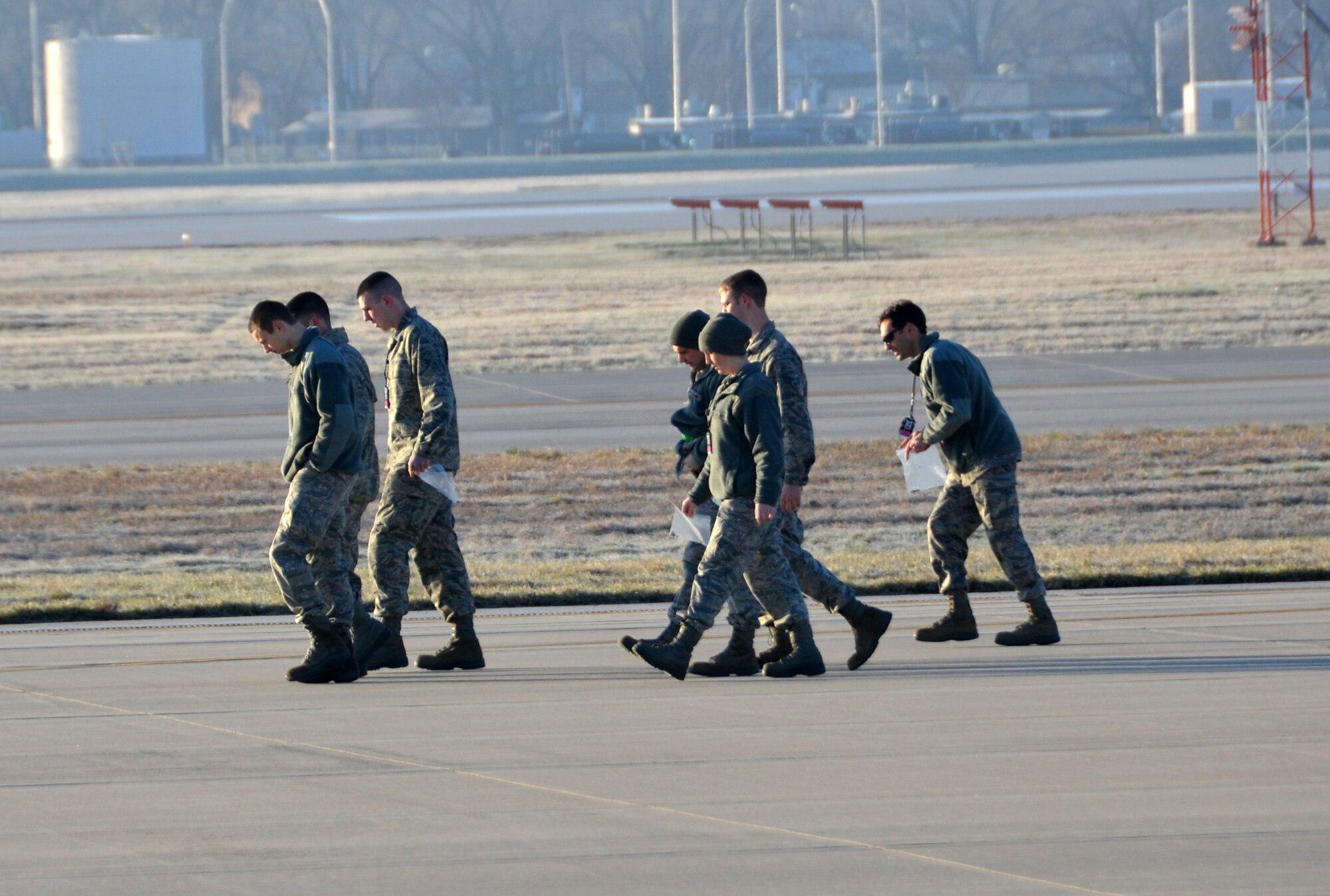 WRIGHT-PATTERSON AIR FORCE BASE, Ohio – Airman from the 445th Airlift Wing  look for debris during the unit’s FOD walk held during the April 6 unit training assembly. (U.S. Air Force photo/Maj. Demetrius Smith)