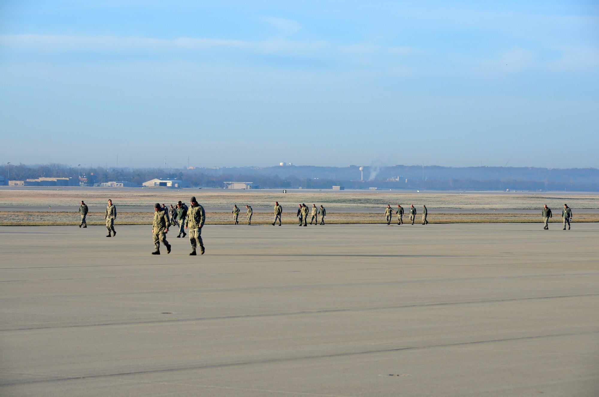WRIGHT-PATTERSON AIR FORCE BASE, Ohio – Airman from the 445th Airlift Wing look for debris during the unit’s FOD walk held during the April 6 unit training assembly. (U.S. Air Force photo/Maj. Demetrius Smith)