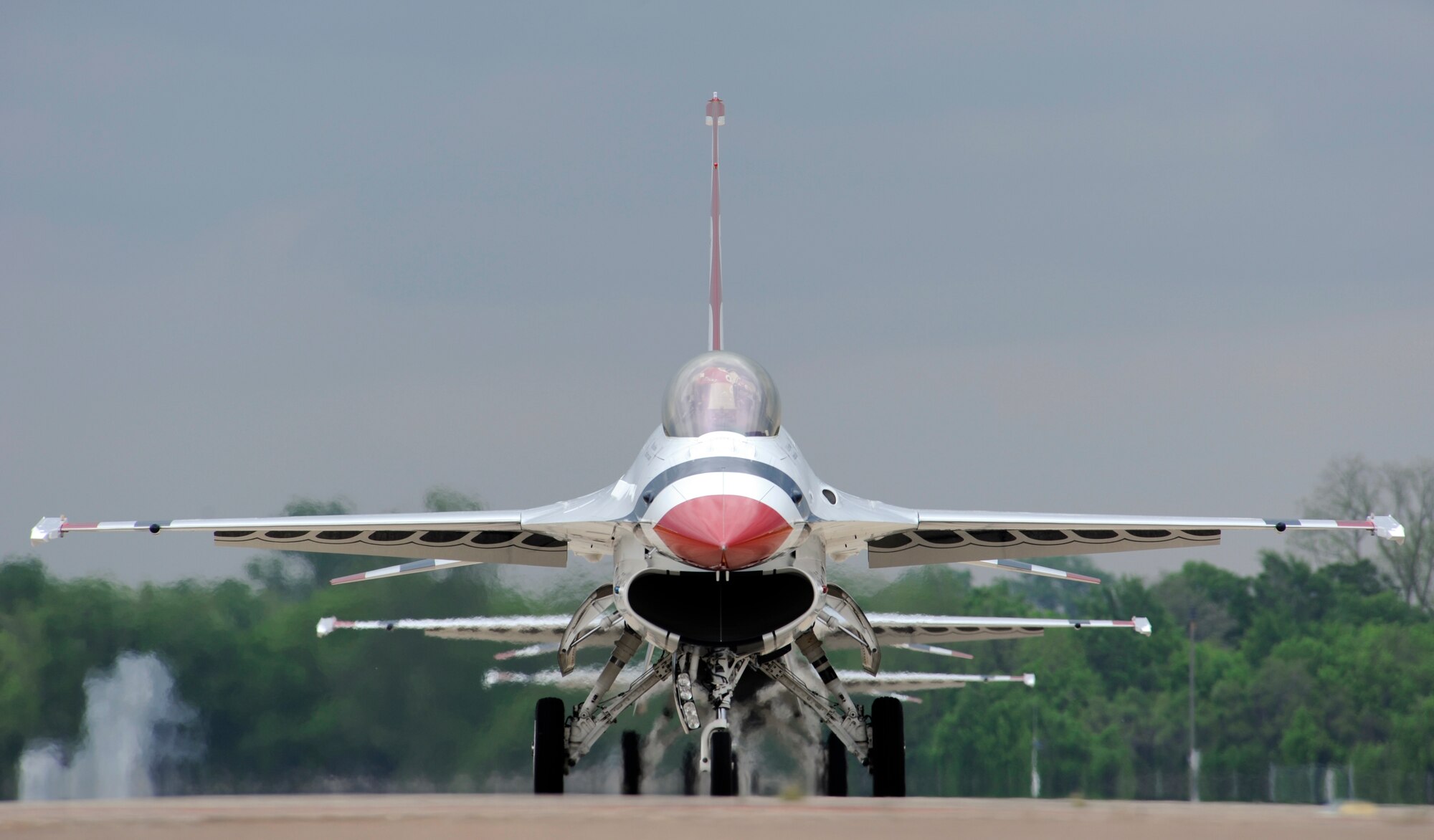 The U.S. Air Force Thunderbirds F-16 Fighting Falcons taxi off the runway at Barksdale Air Force Base, La., April 24, 2014. The Thunderbirds will be the headlining act for the 2014 Defenders of Liberty Air Show. (U.S. Air Force photo/Senior Airman Joseph A. Pagán Jr.)