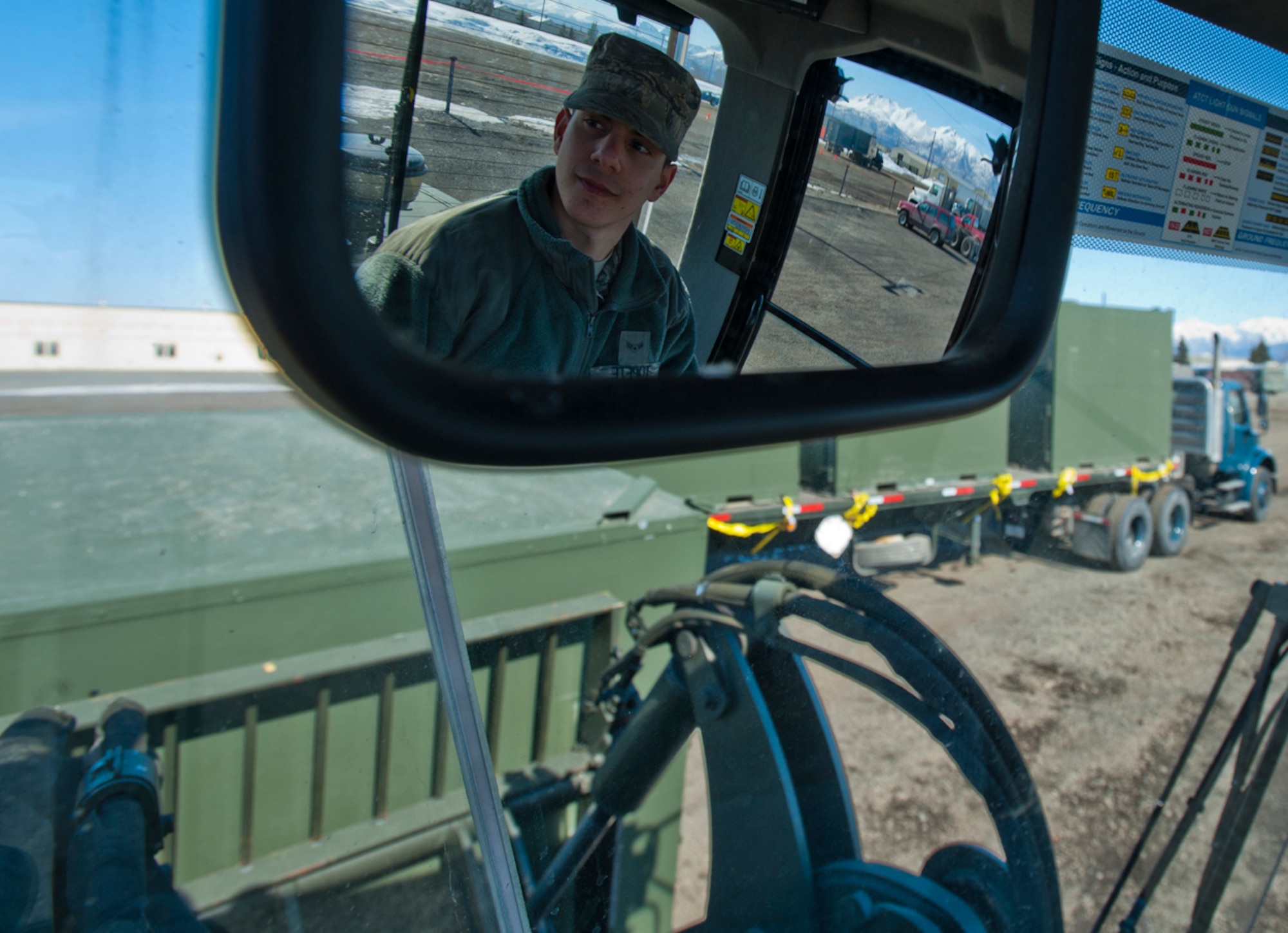 Airman 1st Class Jeffrey Topete uses a forklift to load cargo onto a truck on Joint Base Elmendorf-Richardson, Alaska, April 14, 2014. Topete is a 773d Logistics Readiness Squadron vehicle operator. (U.S. Air Force photo/Staff Sgt. Robert Barnett)