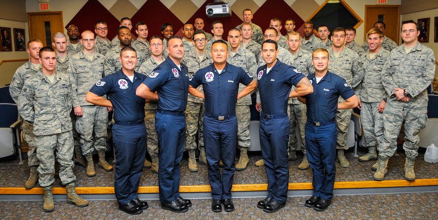 Enlisted members of the U.S. Air Force Thunderbirds pose for a photo with Airman Leadership School students on Barksdale Air Force Base, April 25, 2014. The Thunderbirds met with the students to discuss how they may become more successful Airmen in today’s Air Force. (U.S. Air Force photo/Airman 1st Class Benjamin Raughton)