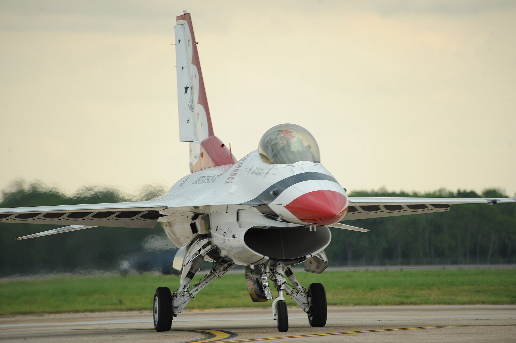 U.S. Air Force Thunderbirds F-16 Fighting Falcon #3 piloted by Maj. Caroline Jensen taxis off of the runway after arriving on Barksdale Air Force Base, La., April 24, 2014. The Thunderbirds, based at Nellis Air Force Base, Nev., is the Air Force's premier aerial demonstration team, performing at air shows and special events worldwide. (U.S. Air Force photo/Senior Airman Benjamin Gonsier)