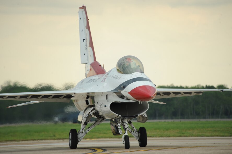 U.S. Air Force Thunderbirds F-16 Fighting Falcon #3 piloted by Maj. Caroline Jensen taxis off of the runway after arriving on Barksdale Air Force Base, La., April 24, 2014. The Thunderbirds, based at Nellis Air Force Base, Nev., is the Air Force's premier aerial demonstration team, performing at air shows and special events worldwide. (U.S. Air Force photo/Senior Airman Benjamin Gonsier)