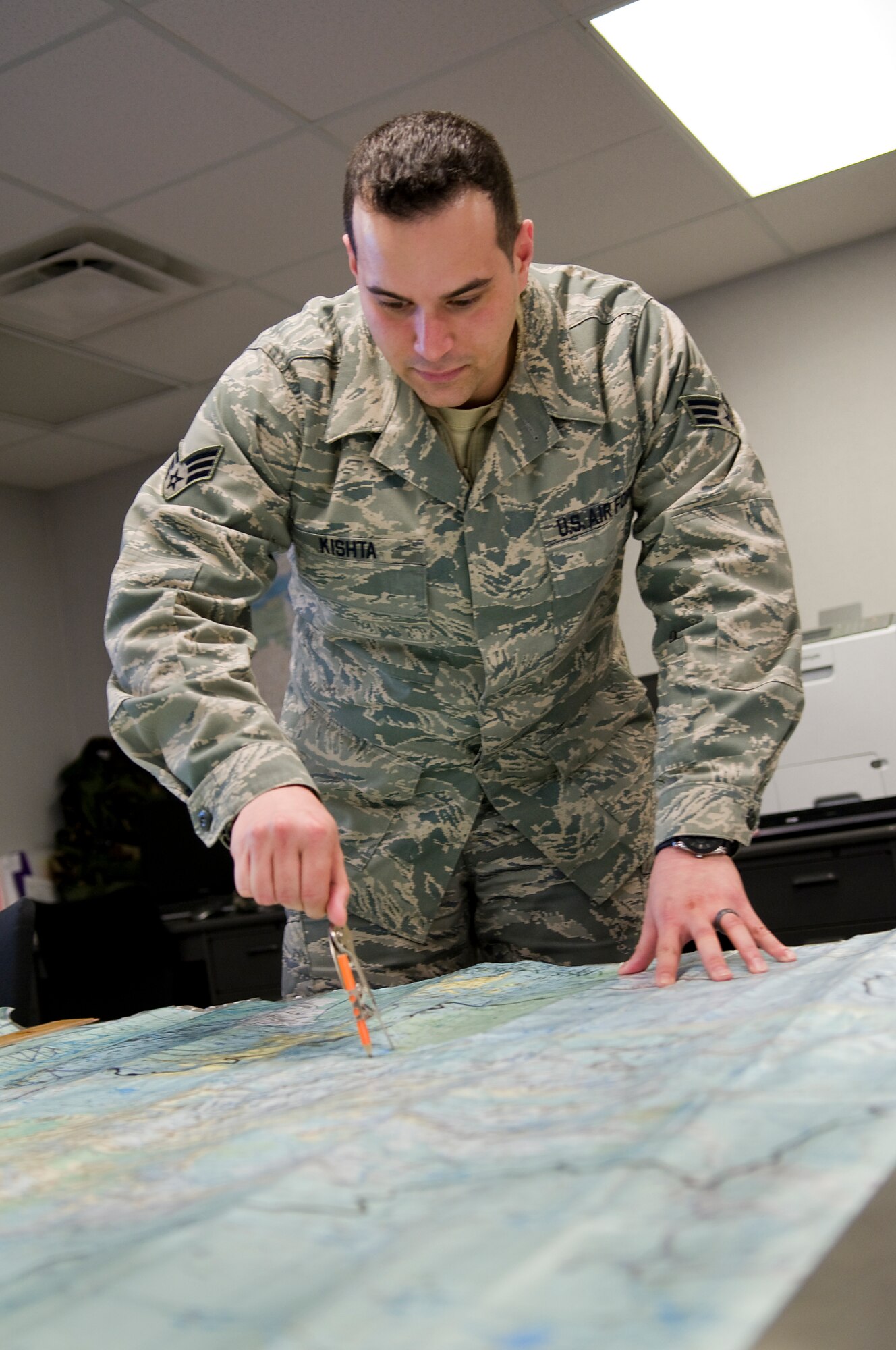 Senior Airman Waleed Kishta, 434th OSS intelligence apprentice, practices intelligence analysis skills at Grissom Air Reserve Base, Ind., March 26, 2014. The 434th OSS intelligence office was recently named the Air Force Reserve's Outstanding OSS Intelligence Surveillance and Reconnaissance Unit of the Year for 2013. (U.S. Air Force photo/Tech. Sgt. Mark R. W. Orders-Woempner) 
