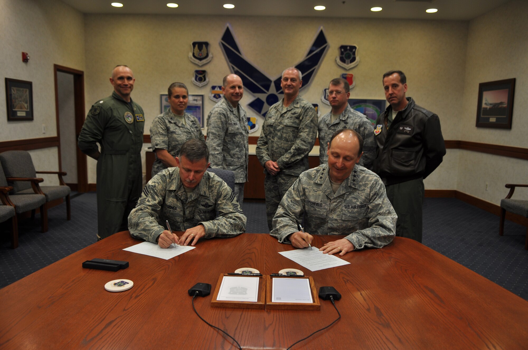 April is Sexual Assault Awareness month and leadership from the Air Force Sustainment Center and across Tinker AFB came together April 17 with members of the Sexual Assault Prevention and Response team to sign a proclamation to reinforce a zero-tolerance policy and draw attention to the issue which is an “intolerable violent crime that affects countless men, women and children in our society.” The group assembled to show a team approach to preventing sexual assault. The proclamation was signed by Lt. Gen. Bruce Litchfield, AFSC commander, seated right; Chief Master Sgt. Gregg Jones, AFSC command chief, seated left; and standing from left, Navy Capt. (select) Ed McCabe, Stratcomm Wing ONE deputy for operations; Col. Linda Hurry, Oklahoma City Air Logistics Complex deputy commander for maintenance; Col. Stephen Wood, 72nd Air Base Wing vice commander; Col. Brian Davis, 507th Air Refueling Wing commander; Col. John Kubinec, AFSC vice commander; and Col. Jay Bickley, 552nd Air Control Wing commander. (Air Force photo)