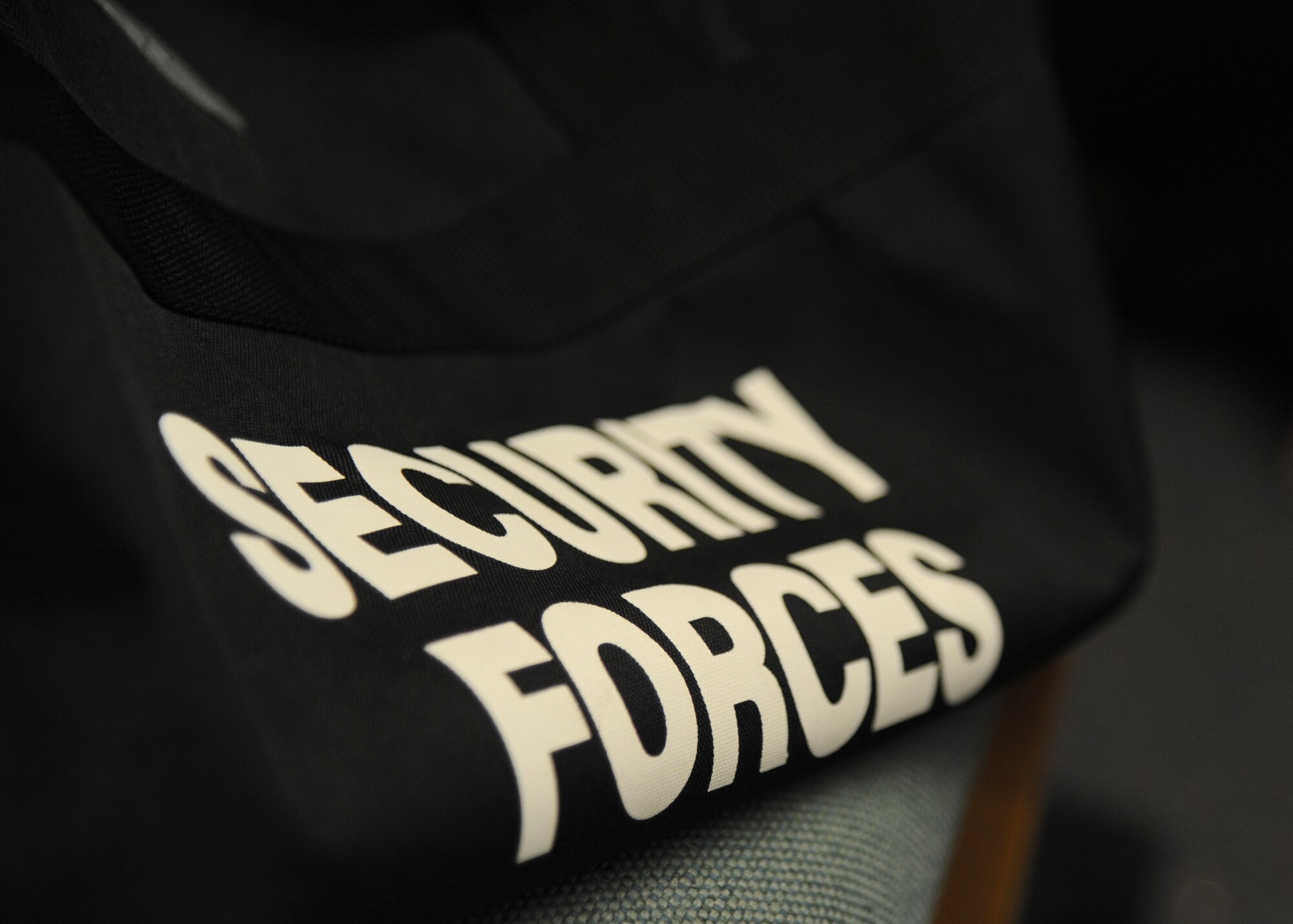 A duffle bag belonging to a member of the 81st Security Forces Squadron lies on a chair during an 81st SFS active shooter training May 28, 2013, at The Locker House, Keesler Air Force Base, Miss.  The two-day annual training prepares the SF Airmen to react during real-world situations.  (U.S. Air Force photo by Kemberly Groue)