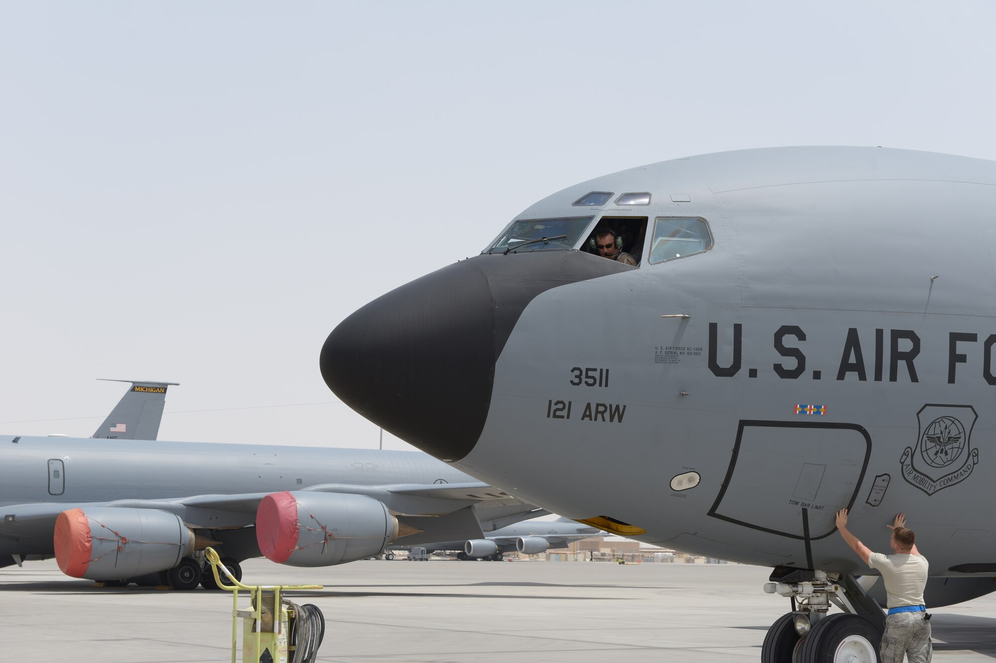 Col. John Lamontagne lands a KC-135 Stratotanker during a fini-flight ceremony at Al Udeid Air Base, Qatar, April 23, 2014. Lamontagne is being fare-welled as the 379th Expeditionary Operations Group commander after a year tour at Al Udeid Air Base. As the 379th EOG commander, Lamontagne oversaw operations from airspace control, aeromedical evacuations, aerial refueling, combat aerial deliveries, operational airlift, intelligence and reconnaissance and close air support throughout the U.S. Central Command’s area of responsibility. Lamontagne hails from Springfield, V.A. and will be the wing commander for the 437th Airlift Wing at Joint Base Charleston, S.C. (U.S. Air Force photo/Senior Airman Hannah Landeros) 