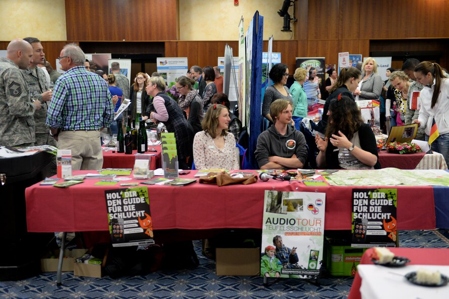 Hundreds of base members visit Club Eifel for the 10th Annual Explore the Eifel Info and Adventure Fair on Spangdahlem Air Base, Germany, April 24, 2014. The 52nd Fighter Wing hosts the annual event to inspire Americans to explore the local area and build a stronger relationship with the host nation. (U.S. Air Force photo by Senior Airman Alexis Siekert/Released)
