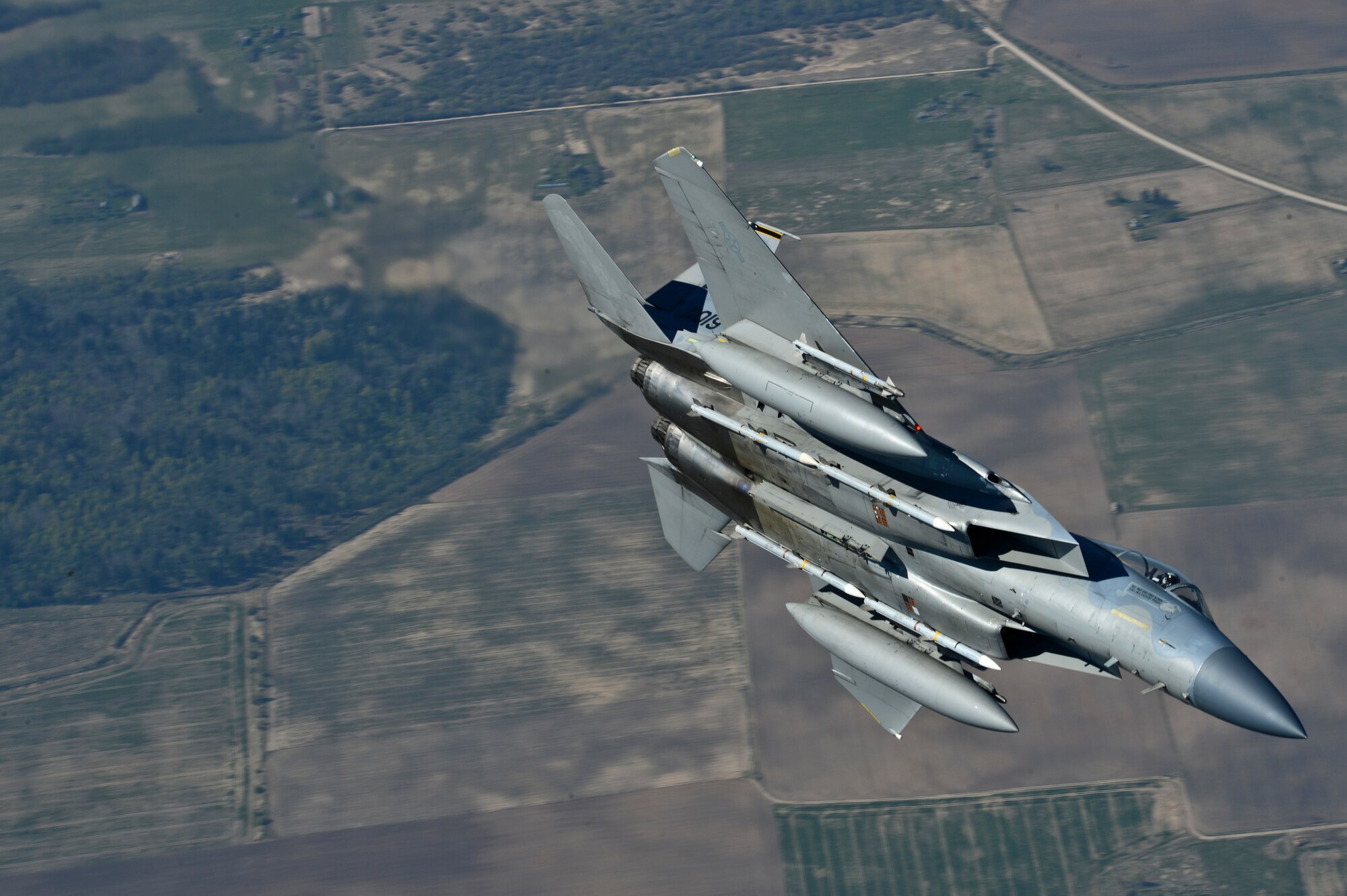 Maj. Barak Amundson, 493rd Expeditionary Fighter Squadron pilot, flies over Lithuania during a training mission with the Lithuanian air force April 23, 2014. The 48th Air Expeditionary Group has been conducting the Baltic Air Policing mission here since January and will be handing over the mission to the Polish air force at the beginning of May. (U.S. Air Force photo by Airman 1st Class Dana J. Butler/Released)