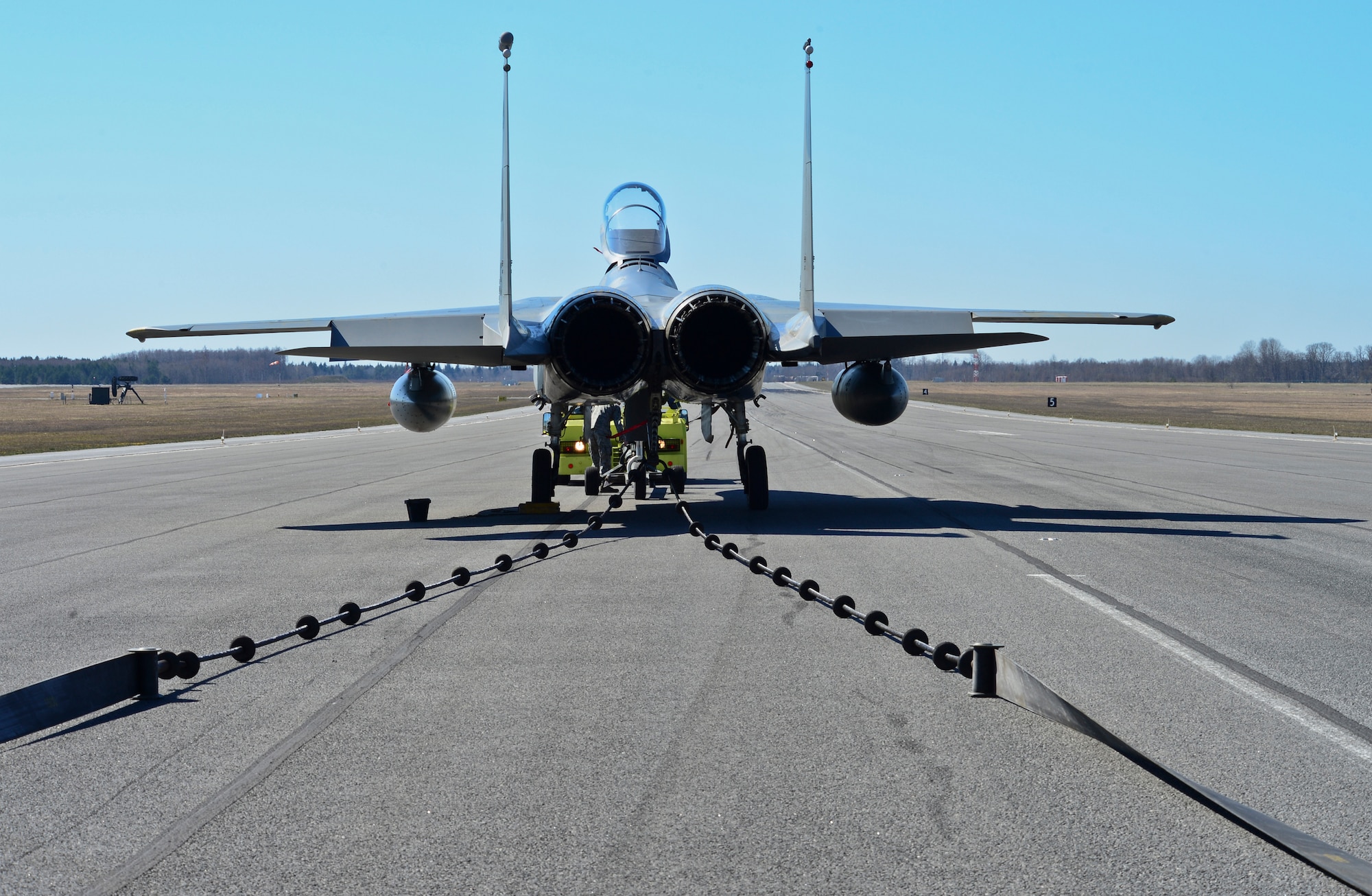 An F-15C Eagle sits on the runway after a certification barrier engagement at Amari Air Base, Estonia, April 22, 2014. Members of the 48th Air Expeditionary Group recently took a trip to Amari AB to engage and certify the aircraft arresting system, taking a critical step toward validating the new NATO Forward Operating Base. (U.S. Air Force photo by Airman 1st Class Dana J. Butler/Released)