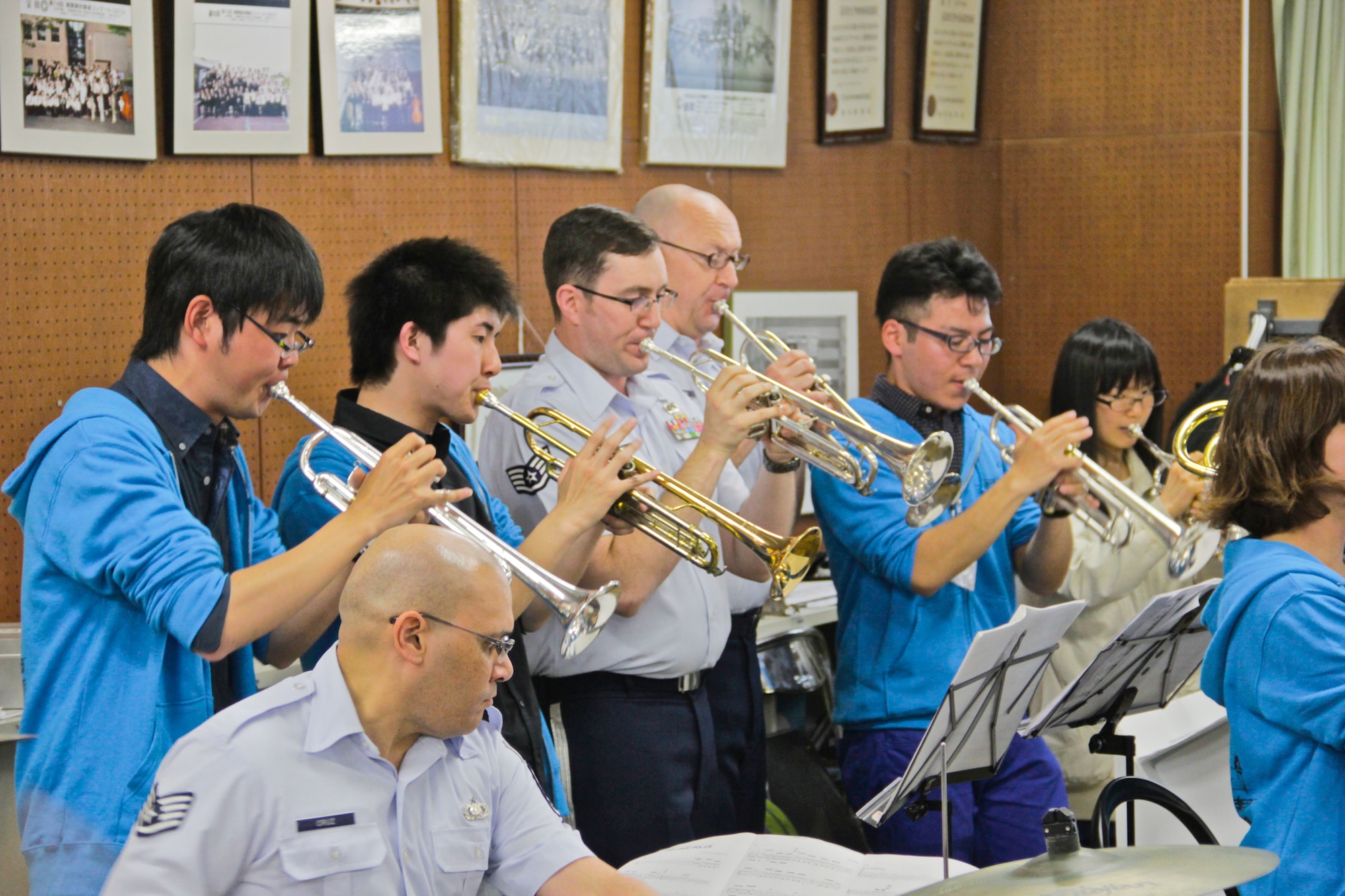 IBARAKI, Japan—Staff Sgt. Tom Salyers and SSgt Richard McMaster, Band of the Pacific Asia trumpet players, perform “Jazz Police” in a joint concert with the “Tsukuba Jazz Orchestra” at Tsukuba University, Tsuchiura City, Ibaraki, Japan, April 18, 2014.  The mini-concert was part of an afternoon performance and cultural exchange with students at the university. (U.S. Air Force photo by Staff Sgt. Geoffrey Fisher)