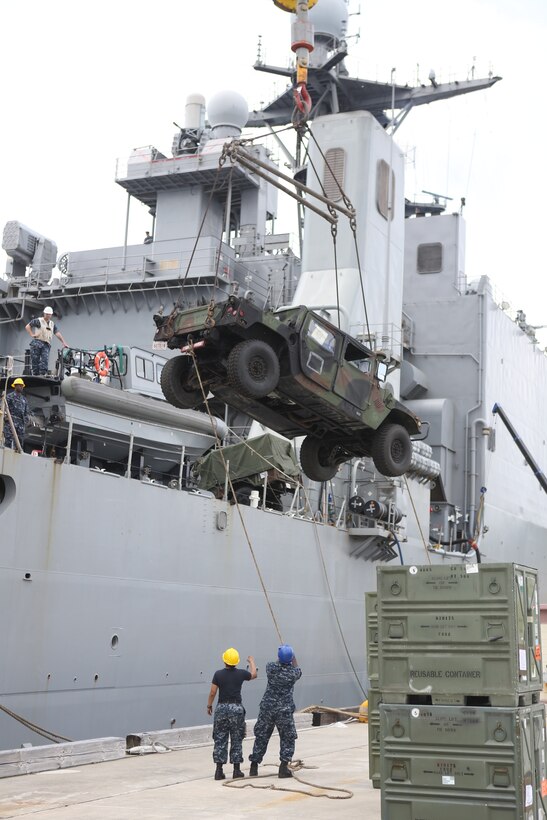 Sailors guide a High Mobility, Multi-purpose Wheeled Vehicle (Humvee) off the USS Ashland (LSD-48) during the offload 31st Marine Expeditionary Unit here, April 18. The 31st MEU is returning from its annual Spring Patrol, where it participated in the largest iteration of Exercise SSang Yong in the history of the bilateral event. The 31st MEU led the 3d Marine Expeditionary Brigade’s ground forces as Regimental Landing Team 31 during a simulated forceful entry in the Republic of Korea. The combat exercise was conducted alongside ROK Marine Corps and Navy forces, as well as soldiers of the Royal Australian Army to make a combined force of more than 13,000. 