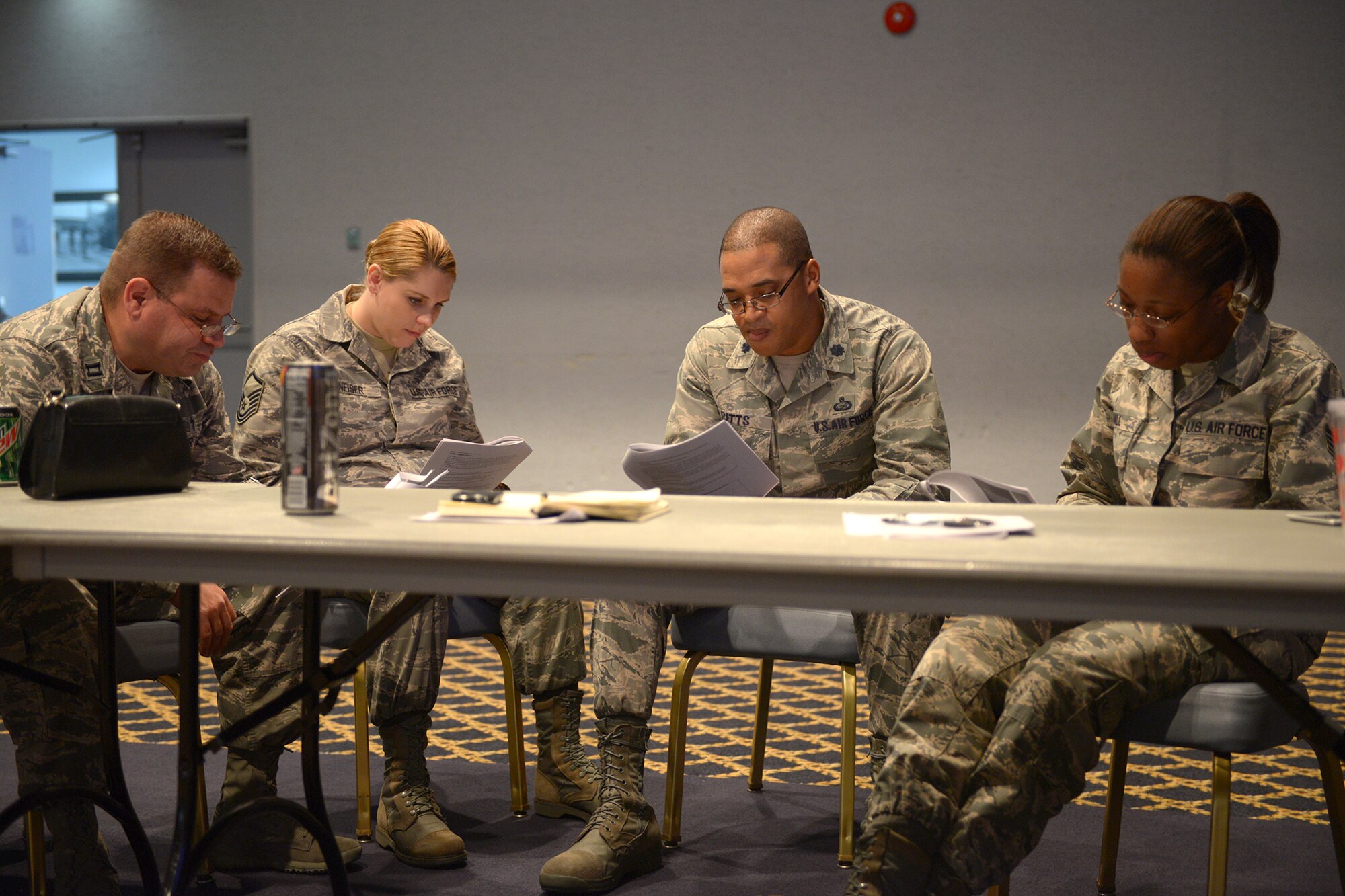 Yokota Airmen take part in group exercises at the sexual assault prevention and response facilitator training at Yokota Air Base, Japan, April 10, 2014. The facilitator program was introduced in response to feedback from Airmen throughout the Air Force who feel that SAPR training led by their peers would prove more effective in spreading SAPR awareness. (U.S. Air Force photo by Airman 1st Class David Danford/Released)