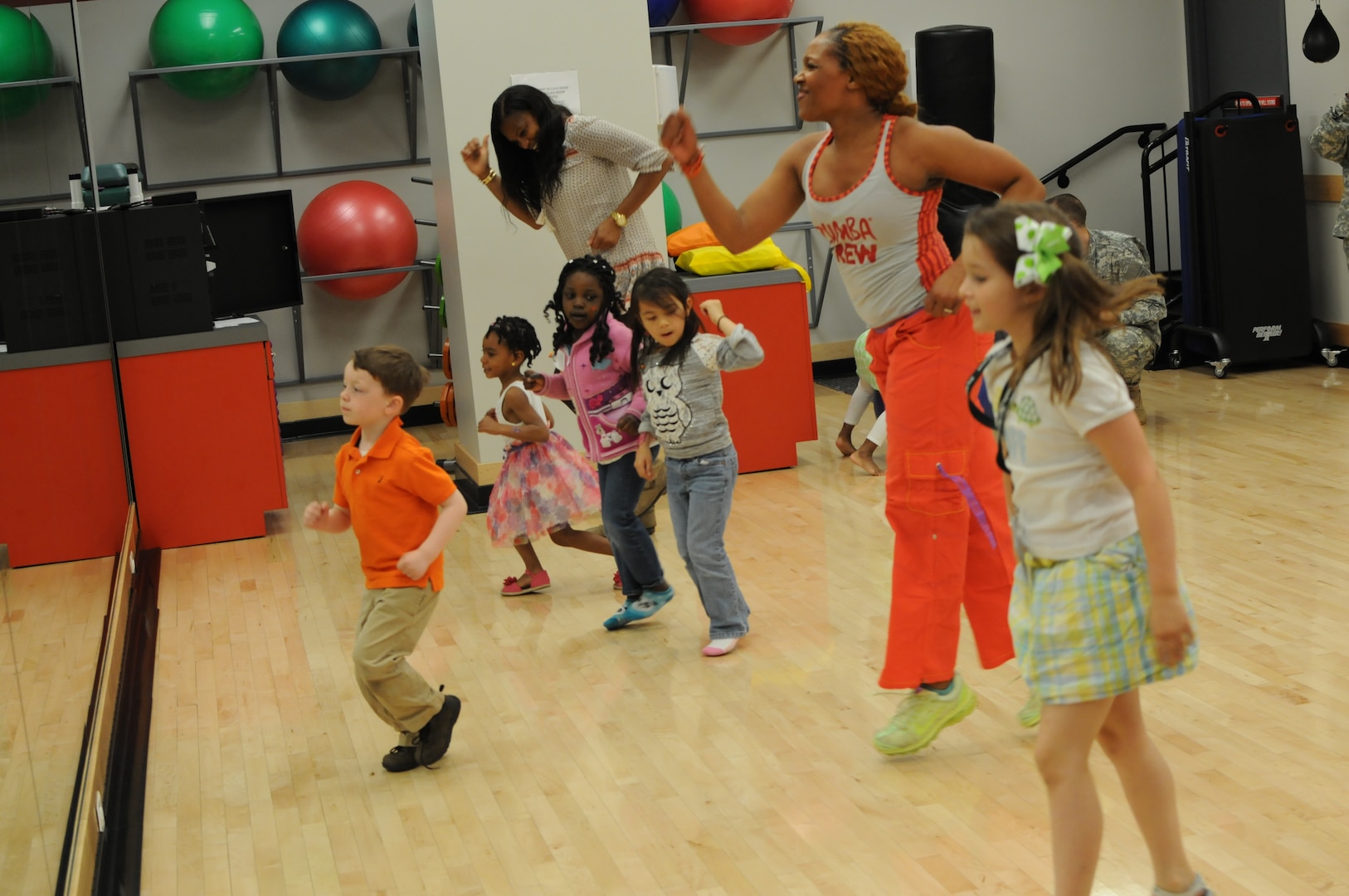 Some impromptu Zumba occupies kids on April 23, 2014, as the Army National Guard celebrates Earth Day and Take Our Daughters and Sons to Work in Arlington, Va.