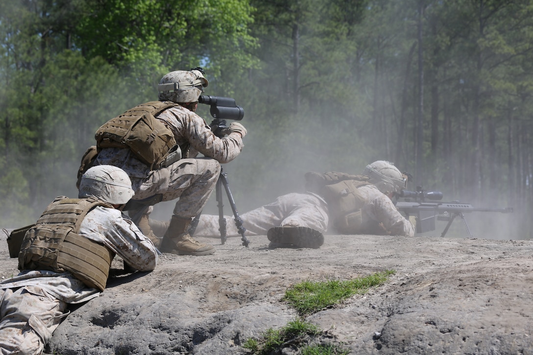 Marines with 2nd Light Armored Reconnaissance Battalion train with the M107 .50 Caliber Special Application Scoped Rifle at a range aboard Marine Corps Base Camp Lejeune, NC, April 23, 2014. The training lasted three days in which designated Marines learned to safely, efficiently and effectively employ the SASR. Along with practical application of the weapon, the Marines also received two days of classroom time to learn the basics on the weapon system.