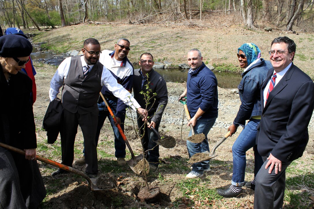 The U.S. Army Corps of Engineers' Philadelphia District and the Philadelphia Water Department celebrated the completion of the daylighting of the Indian Creek as part of the Cobbs Creek Watershed Habitat Restoration during an April 25, 2014 event at Morris Park in the Overbrook section of Philadelphia. Army Corps leadership and staff, city and state officials, community groups, and contractors planted a ceremonial tree during the event. 