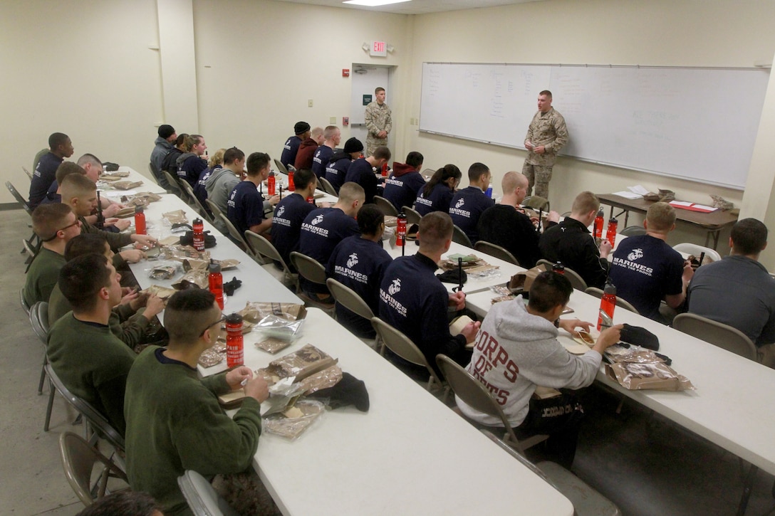 Officer candidates from Recruiting Station Springfield and Recruiting Station Portsmouth receive class room instruction during the officer candidate’s school prep weekend, on Camp Fogarty, April 26. The three day training events were designed to prepare the possible Marine Corps officers for Officer Candidates School in Quantico, Va. (Official Marine Corps Photo by Sgt. Richard Blumenstein)¬