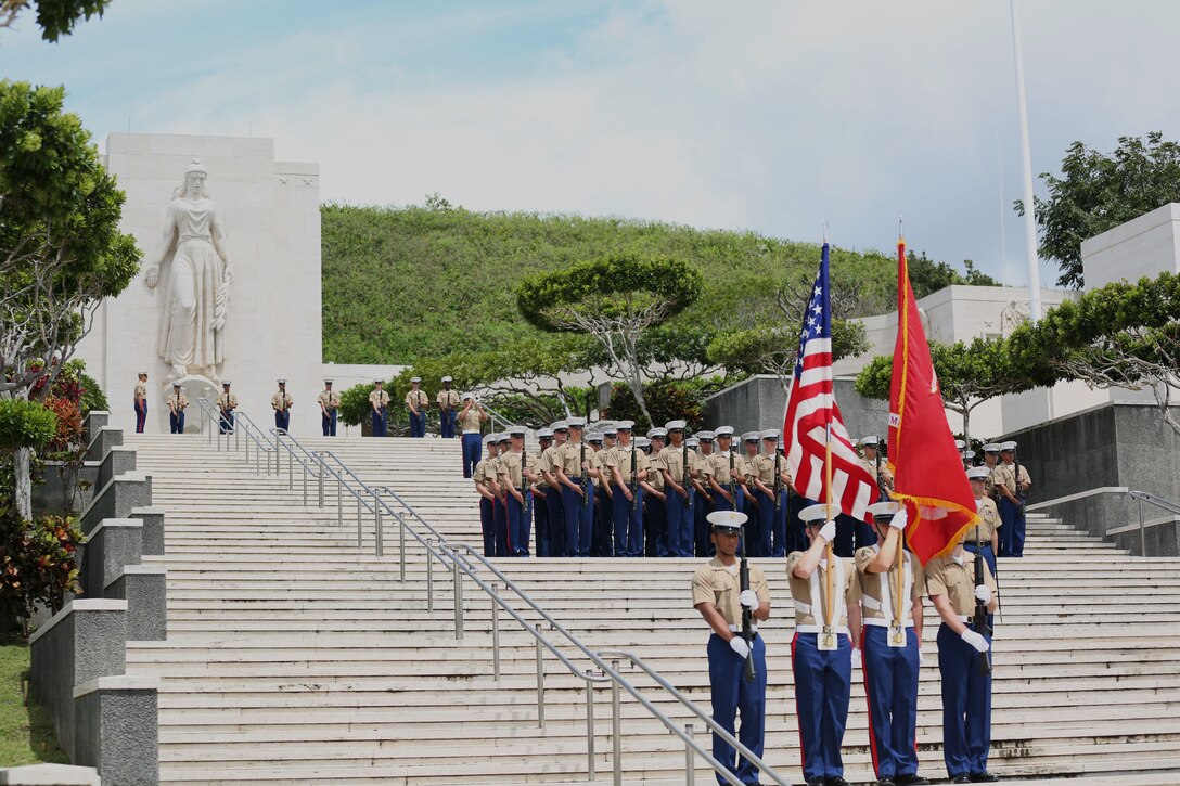 Marines from U.S. Marine Corps Forces, Pacific and 3rd Battalion, 3rd Marine Regiment, stand at present arms during the 2014 Australian-New Zealand Army Corps (ANZAC0) Day in Honolulu April 25. This year marks the 42nd year MarForPac provided all military support for this ceremony.